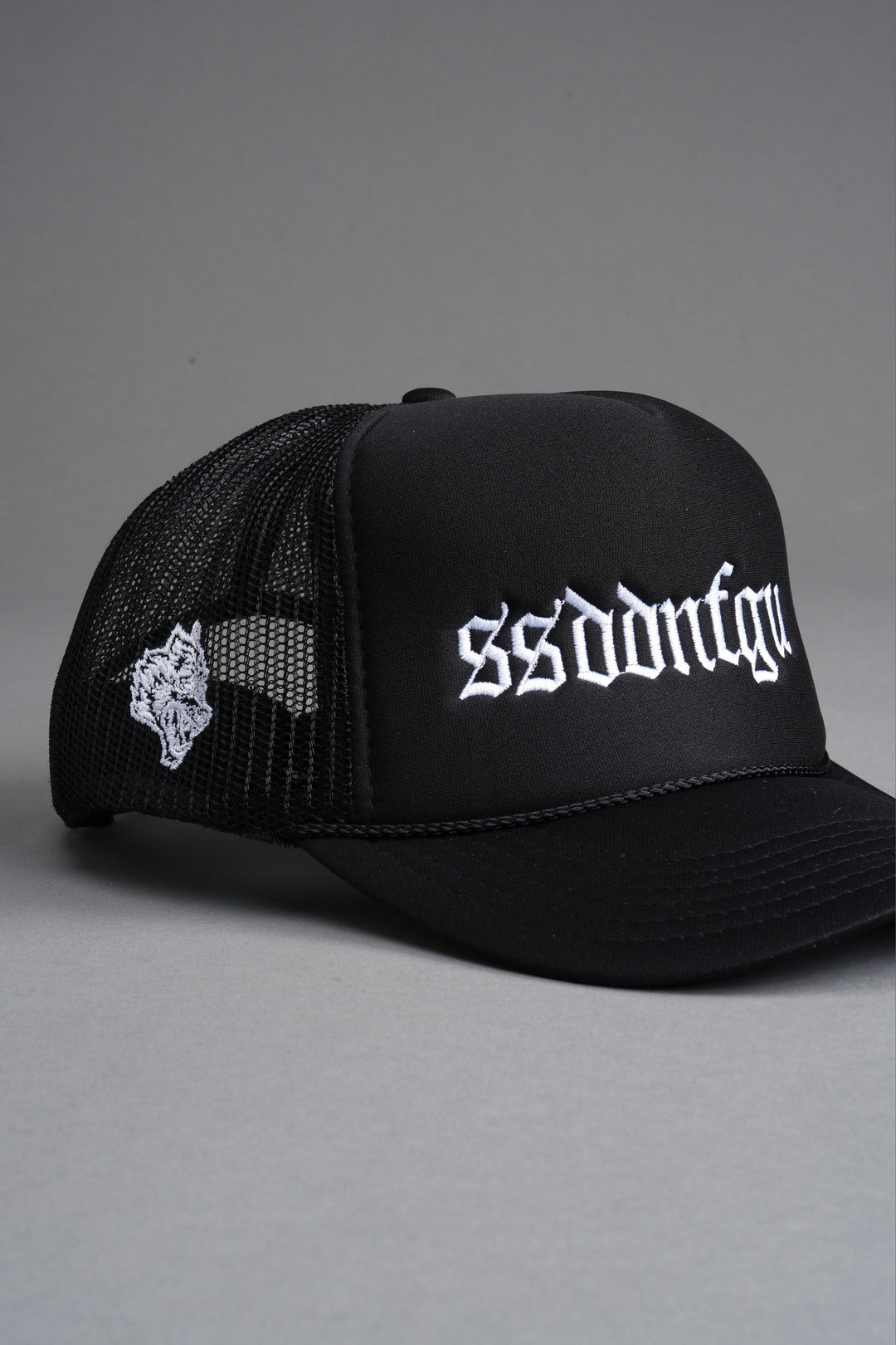 Our Mantra Trucker Hat in Black