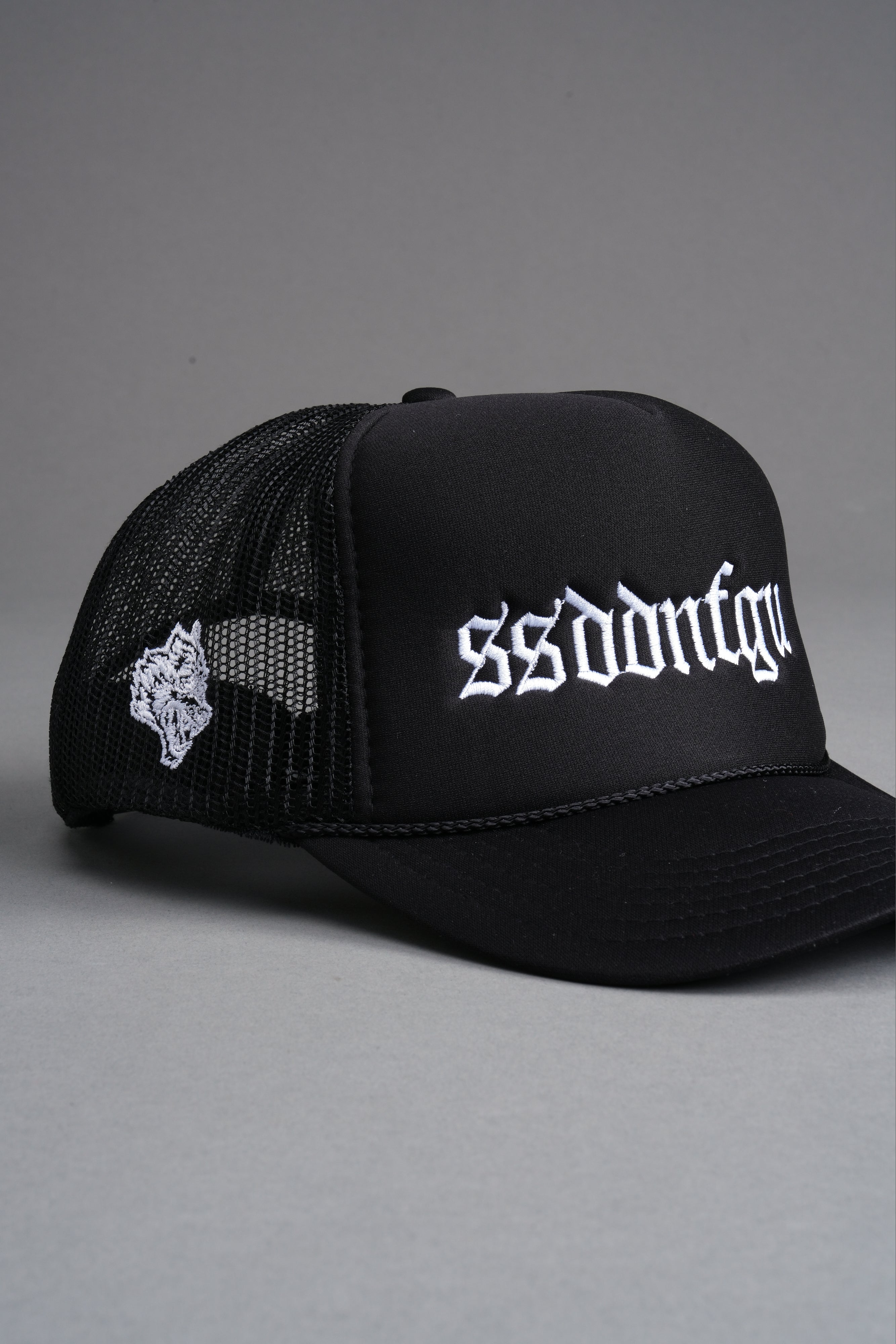 Our Mantra Trucker Hat in Black