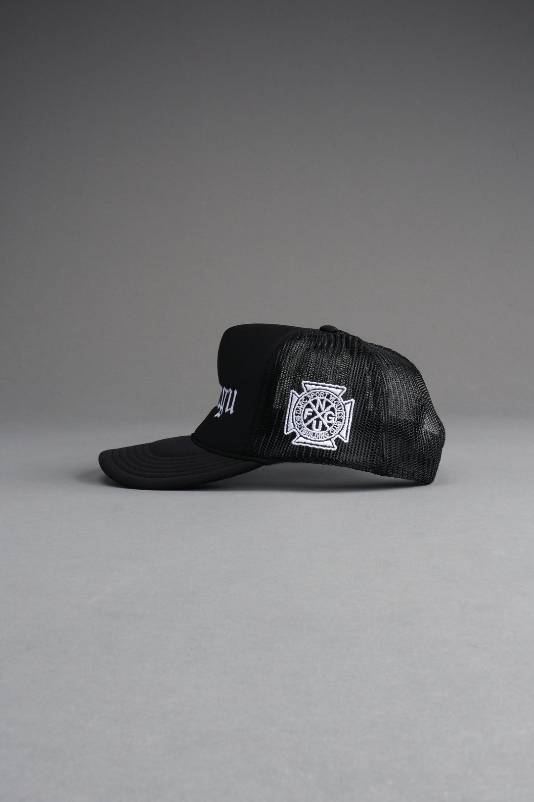 Our Mantra Trucker Hat in Black