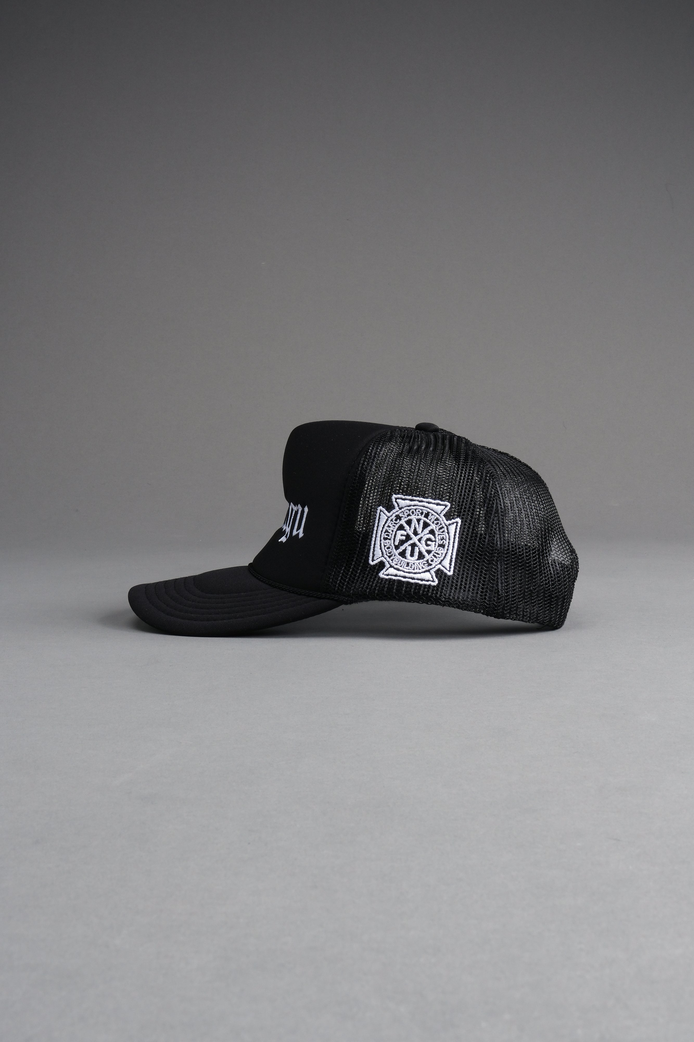 Our Mantra Trucker Hat in Black