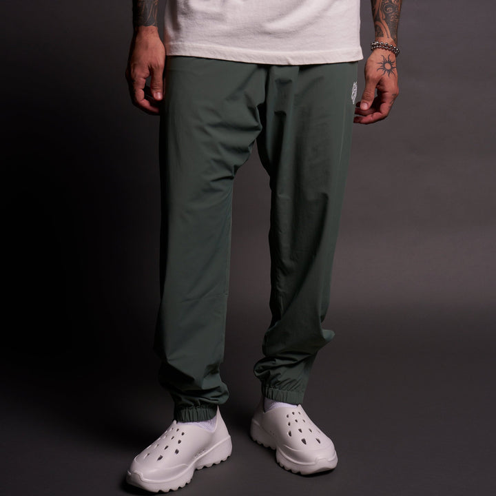 Dual Wolf Head Hybrid Nylon Track Pants in Hunter Green