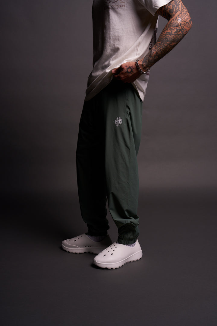 Dual Wolf Head Hybrid Nylon Track Pants in Hunter Green