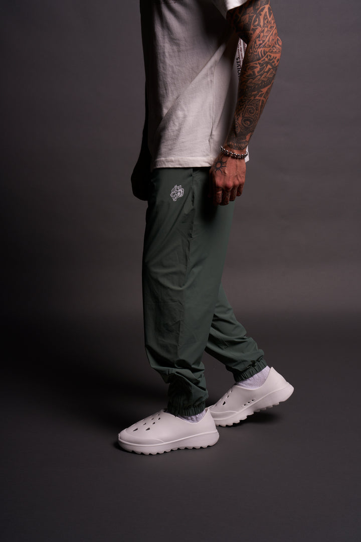 Dual Wolf Head Hybrid Nylon Track Pants in Hunter Green