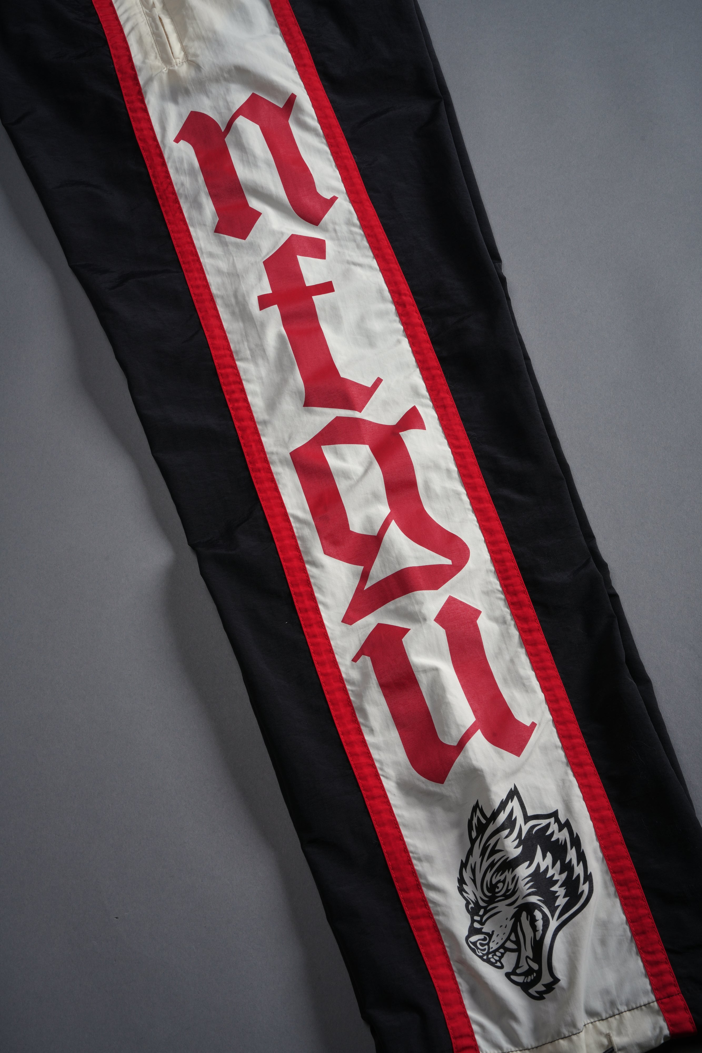 SSDDNFGU Remind Track Pants in Black/Cream/Red