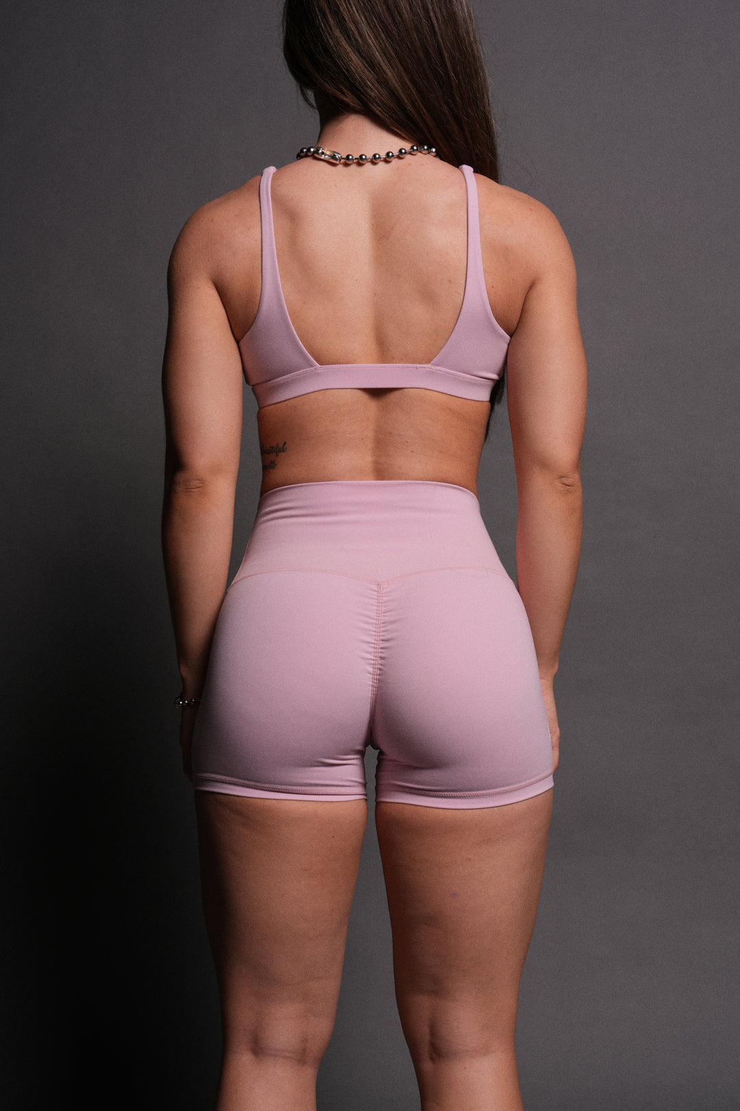 Dual Wolf Pump Energy Shorts in Pink Dust