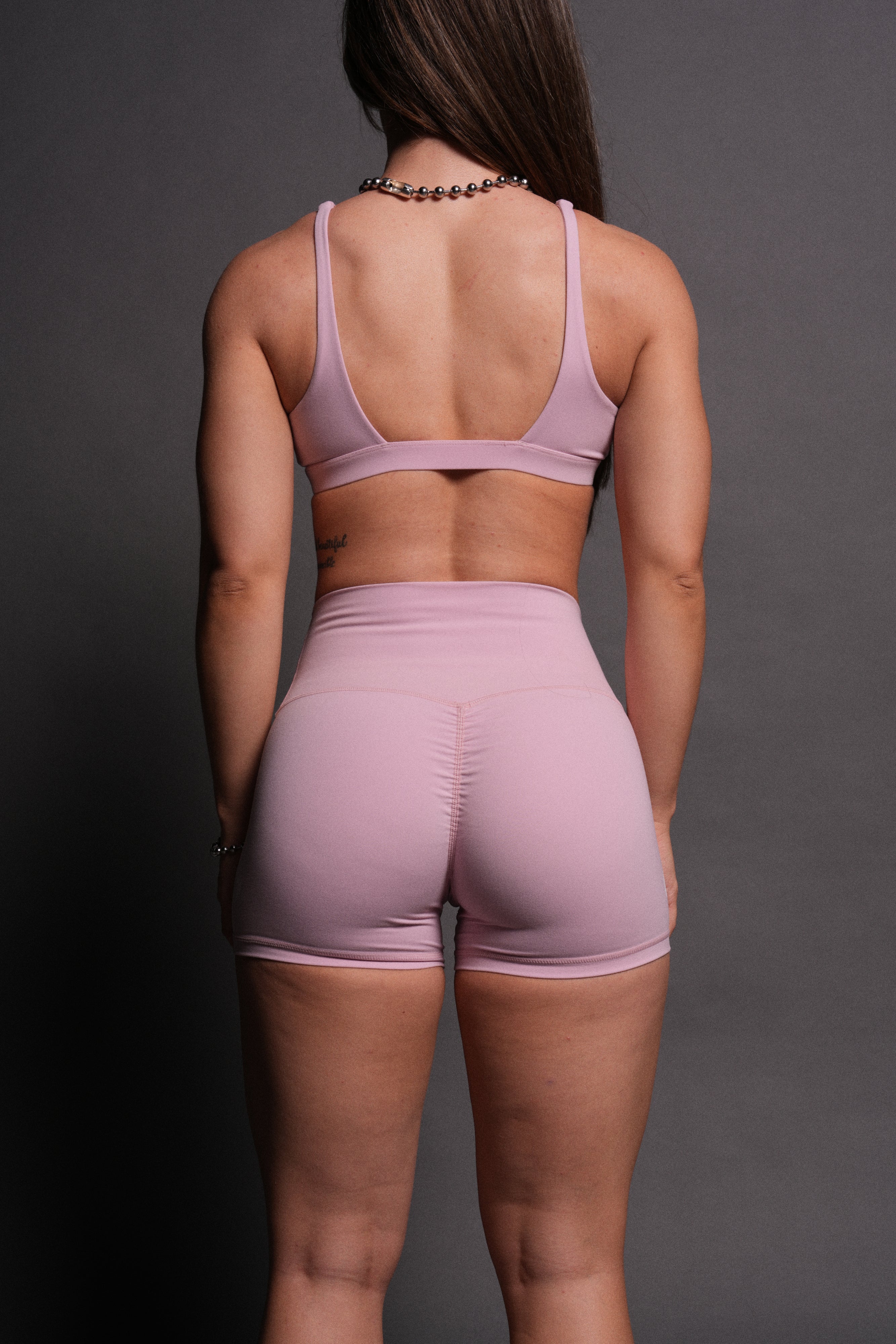 Dual Wolf Pump Energy Shorts in Pink Dust