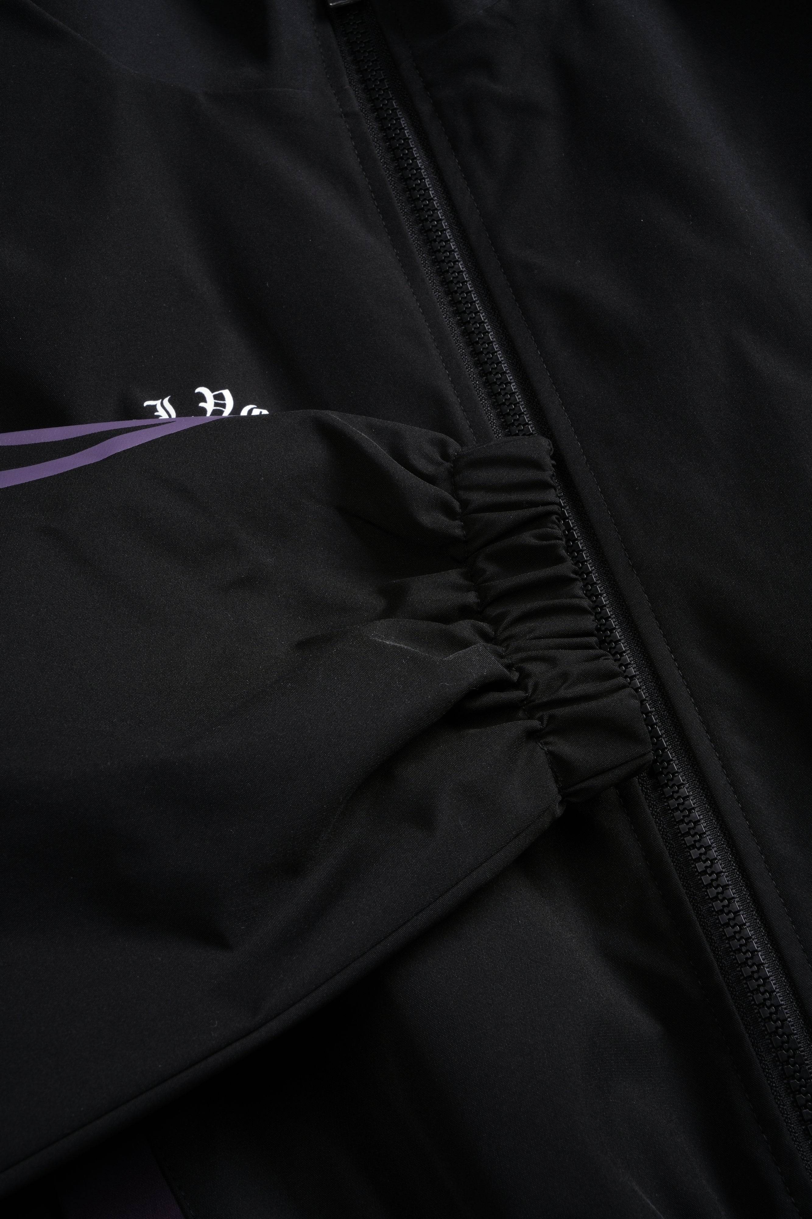 Wolves Finite Code Nadia Track Jacket in Black/Phantom Purple