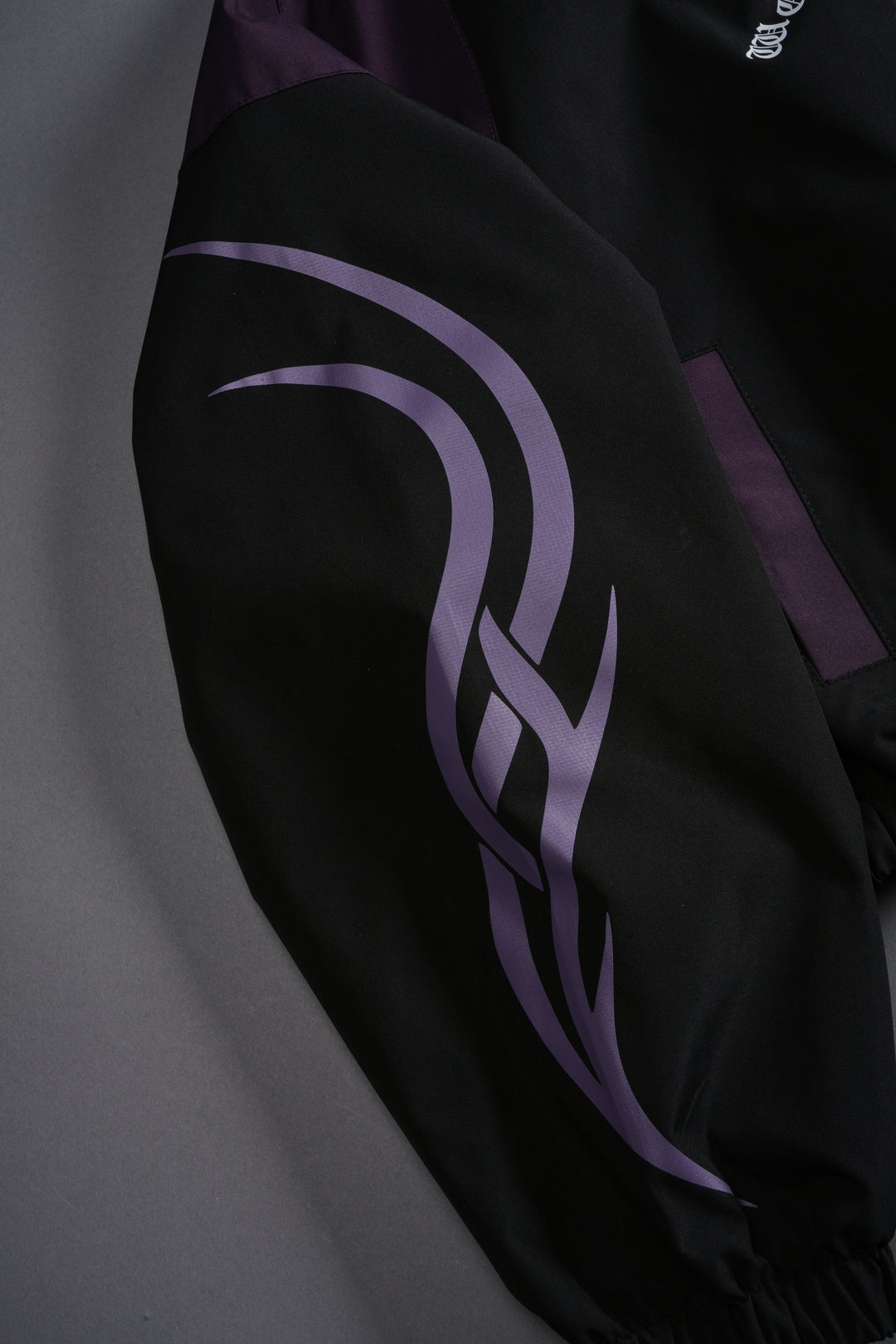 Wolves Finite Code Nadia Track Jacket in Black/Phantom Purple