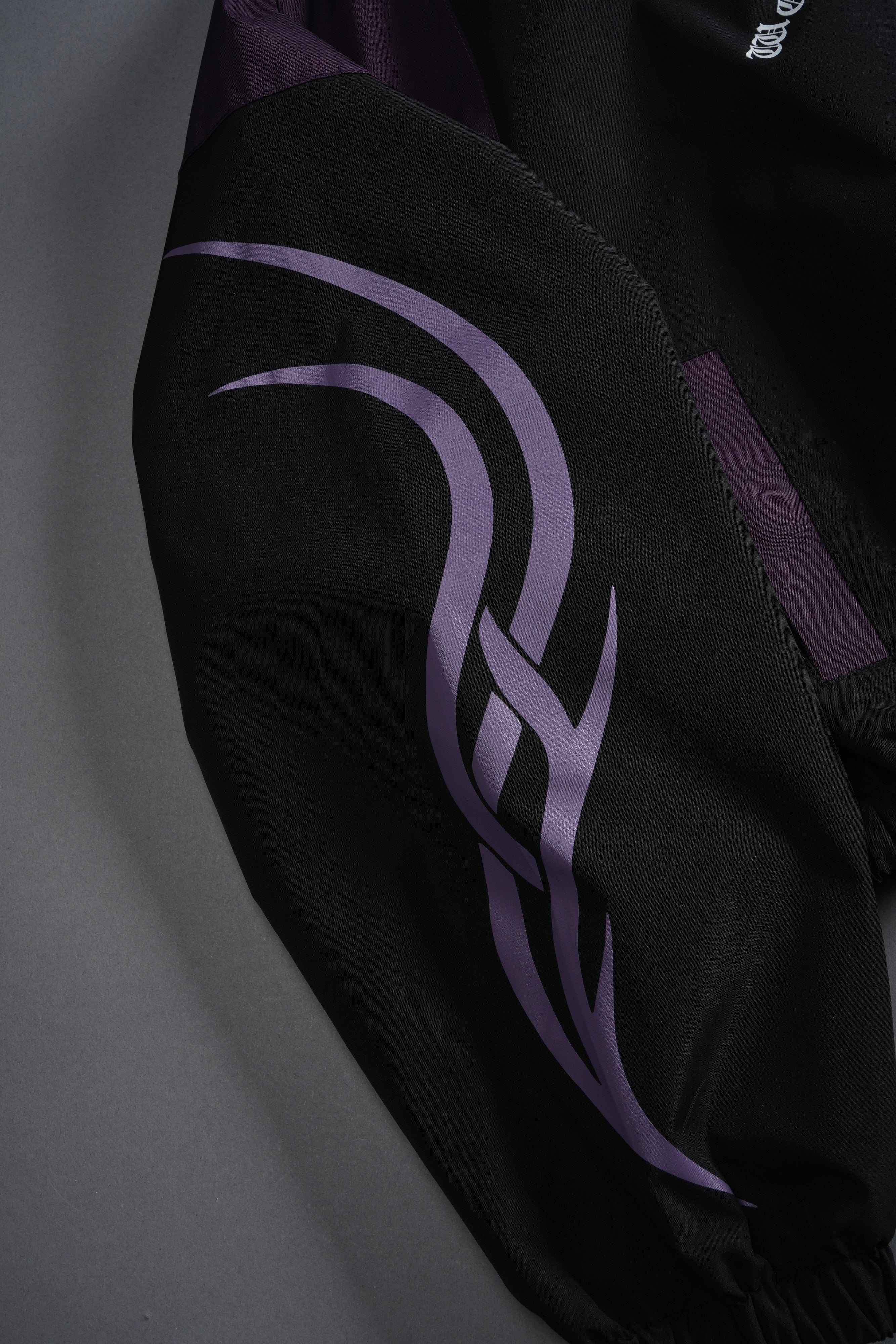 Wolves Finite Code Nadia Track Jacket in Black/Phantom Purple
