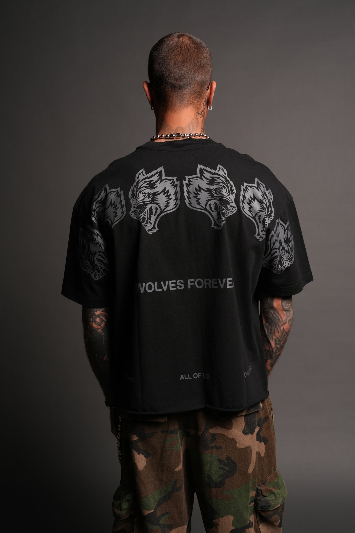 Wolves Have Your Back Distressed Grunge Mid Length Raw Hem Tee In Black