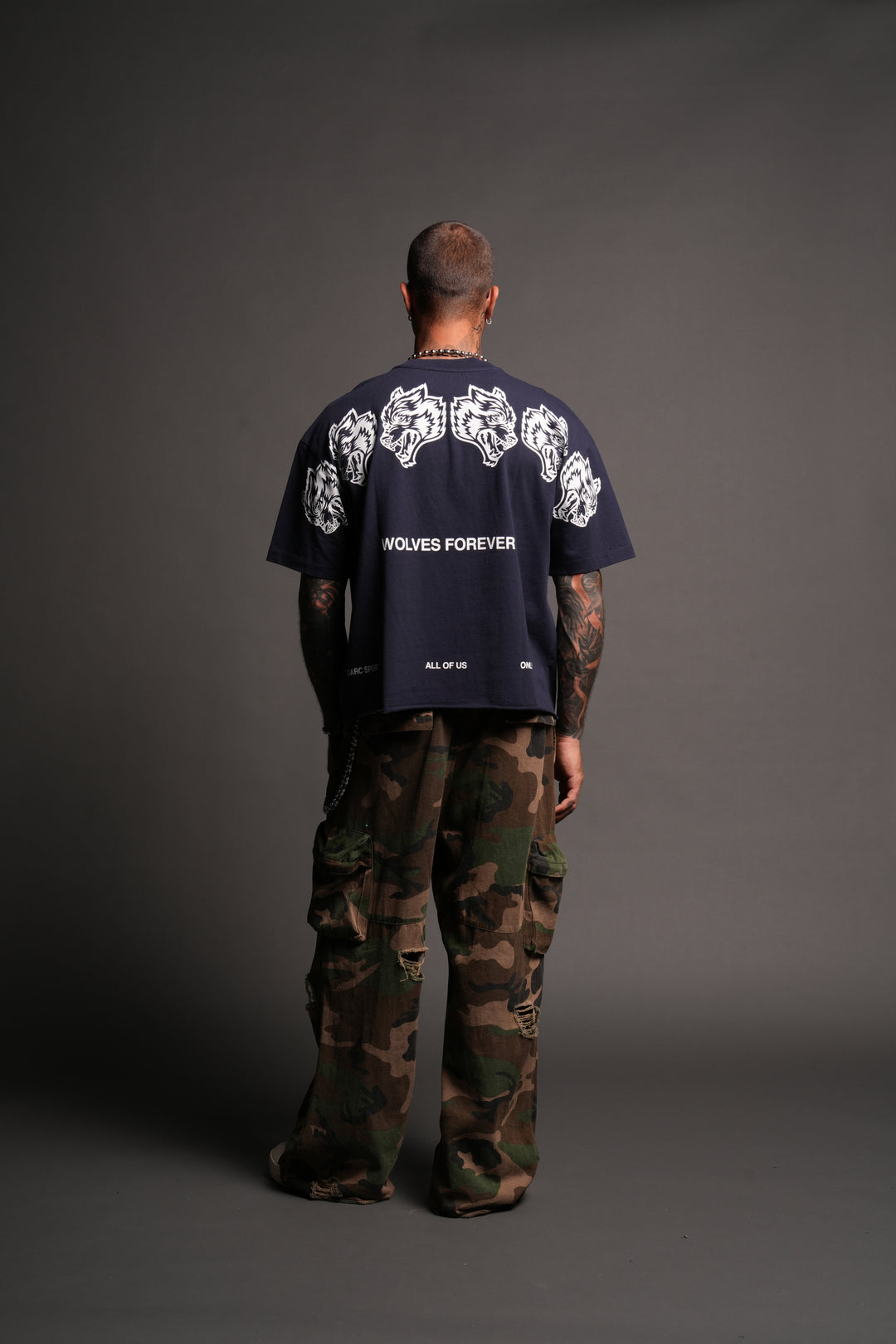 Wolves Have Your Back Distressed Grunge Mid Length Raw Hem Tee In Navy