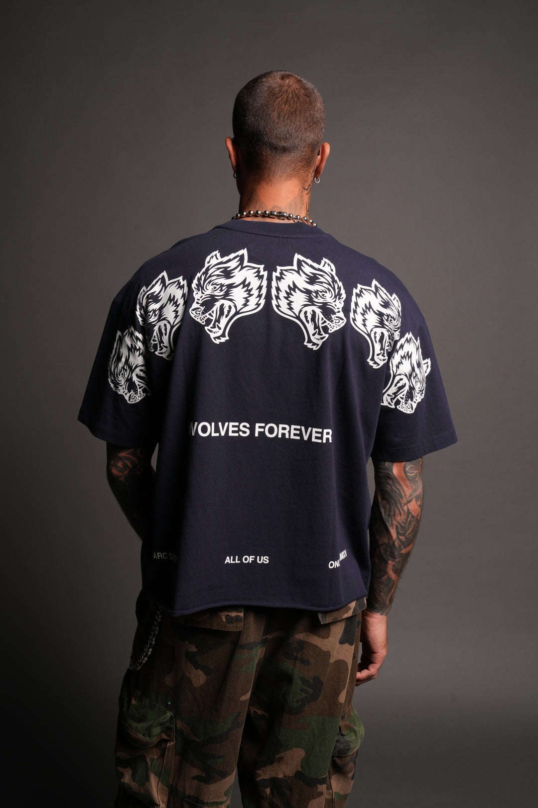 Wolves Have Your Back Distressed Grunge Mid Length Raw Hem Tee In Navy