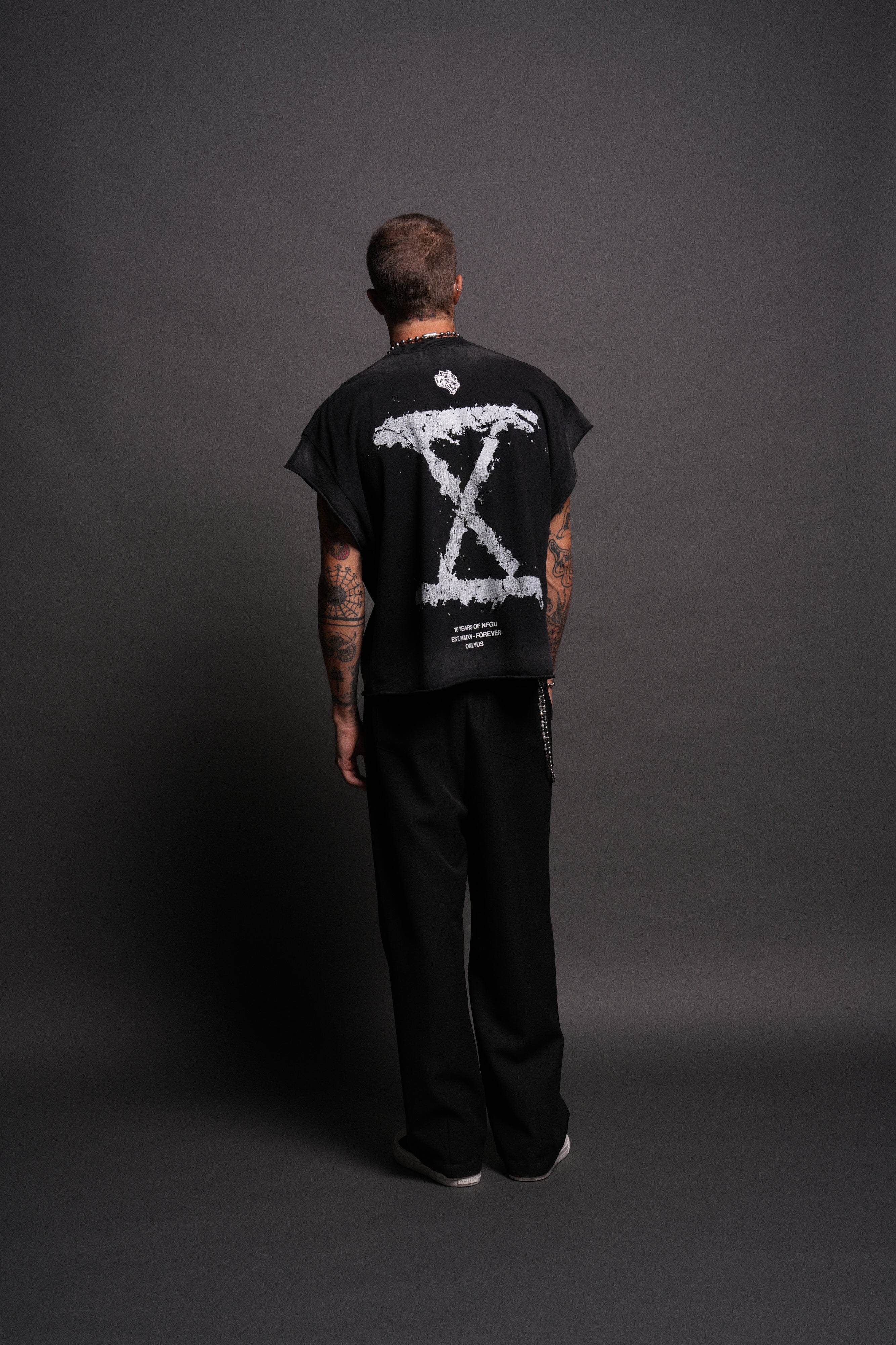 10 Years of NFGU Grunge Cut-Off Tee in Black Drift Wash