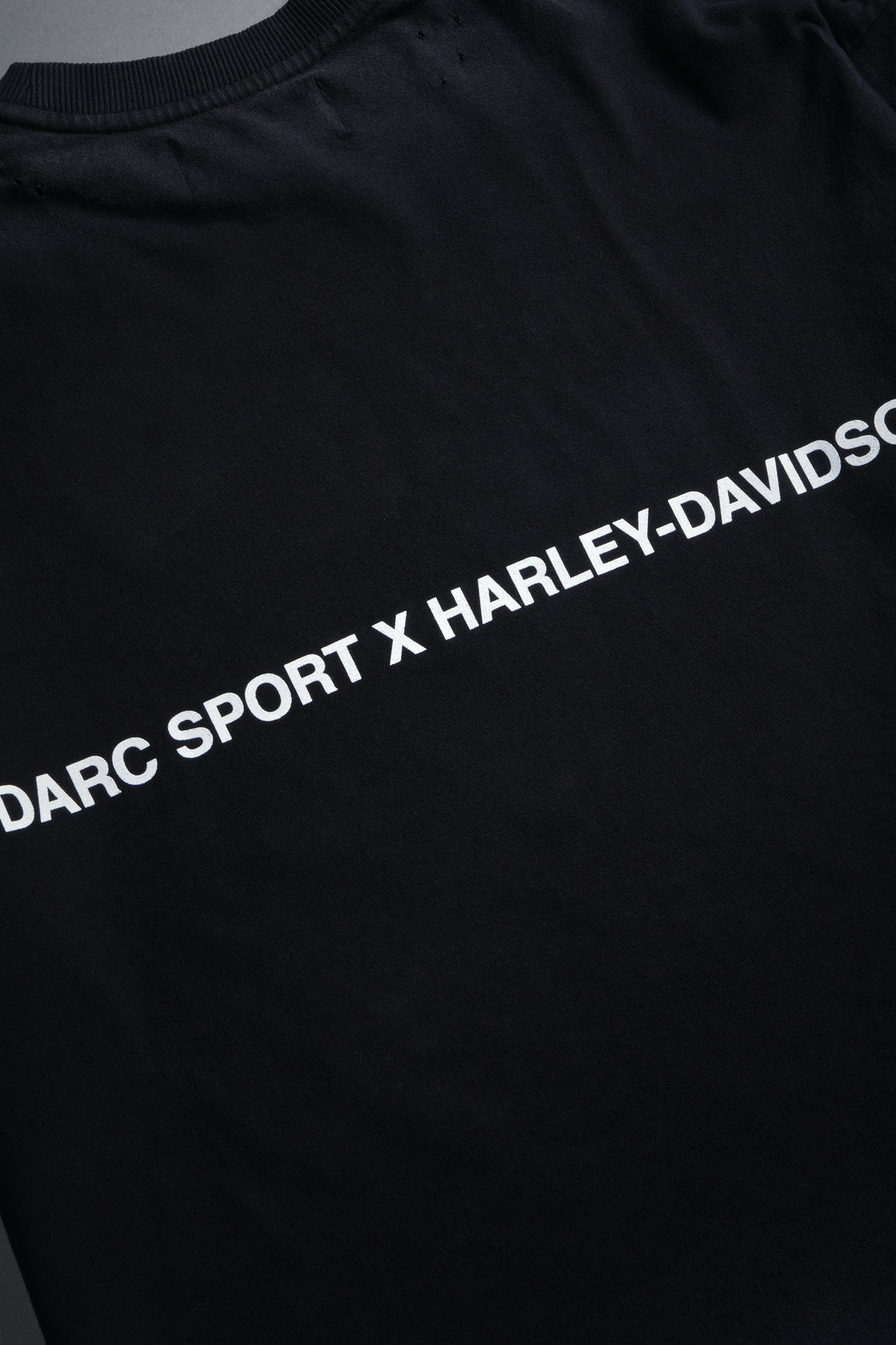 Born From Fire Distressed Grunge Mid-Length Raw Hem Tee in Black Drift Wash