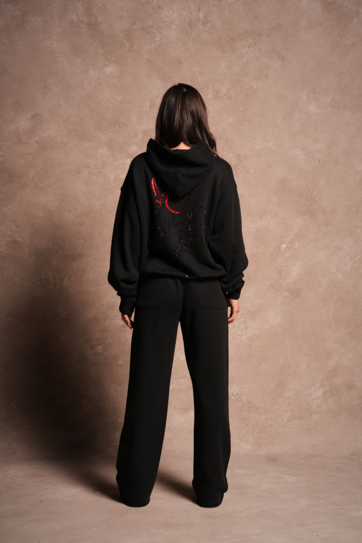Watch Her Shine Pierce Hoodie in Black