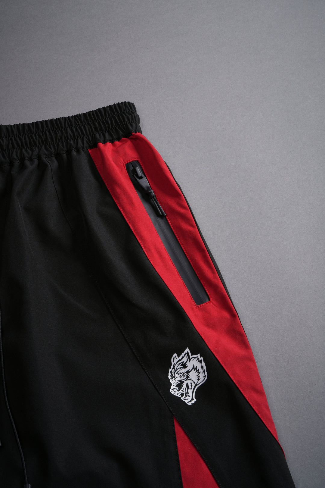 Dual Wolf Chopper Brolic Unisex Track Pants in Black/Red