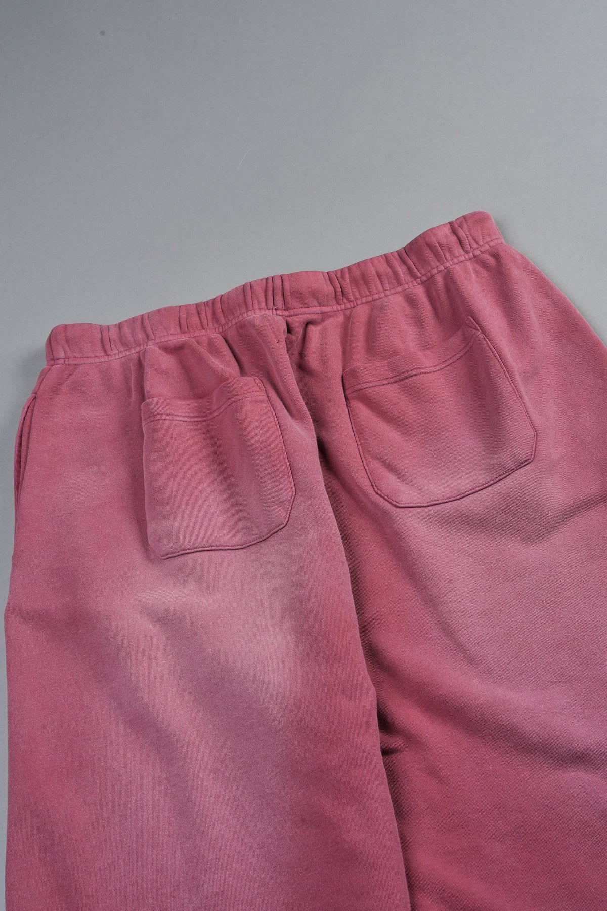 Dual Wolf Capri Sweat Pants In Cherry Red Super Sun Fade