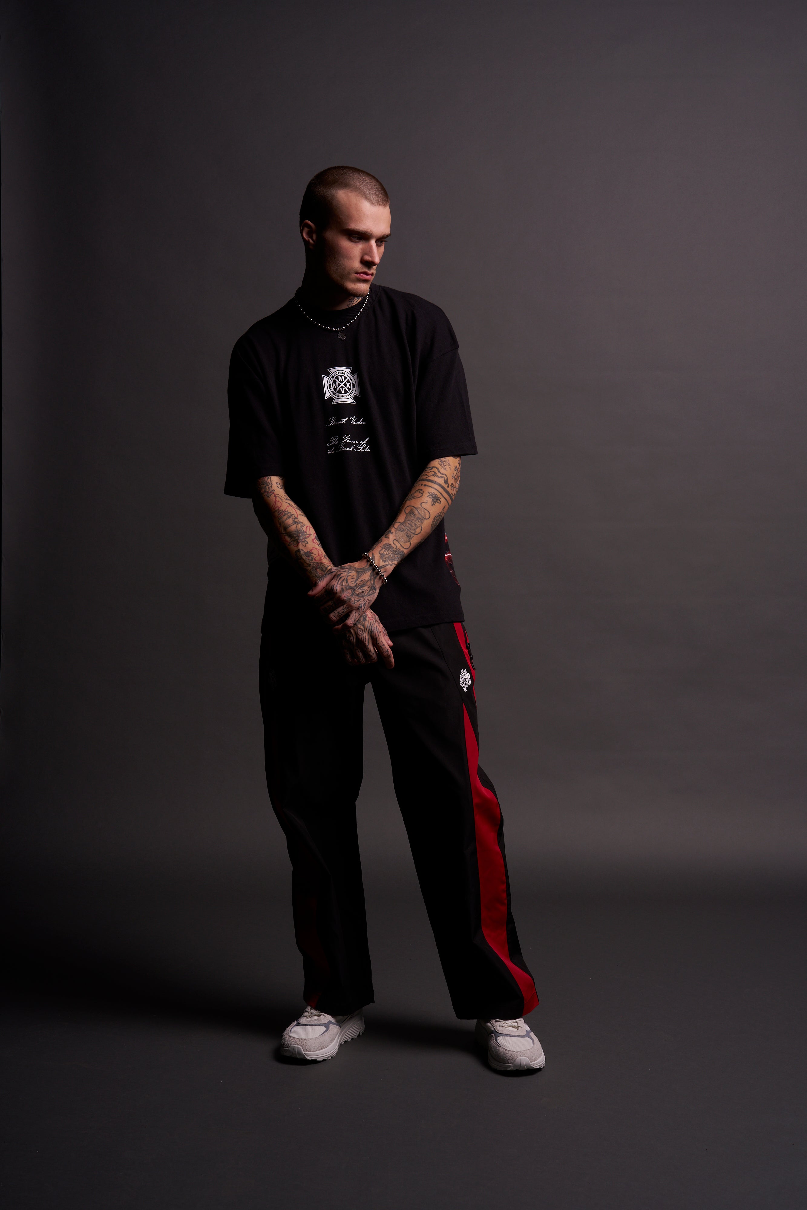 Dual Wolf Chopper Brolic Unisex Track Pants in Black/Red