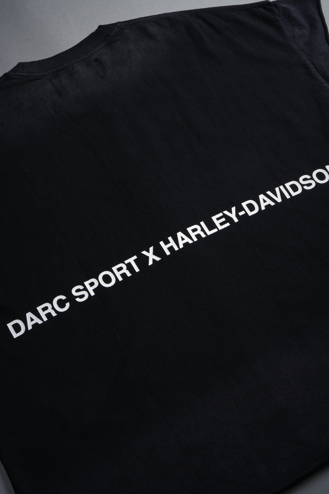 Inferno Shield Grunge Cut-Off Mid-Length Raw Hem Tee in Black Drift Wash