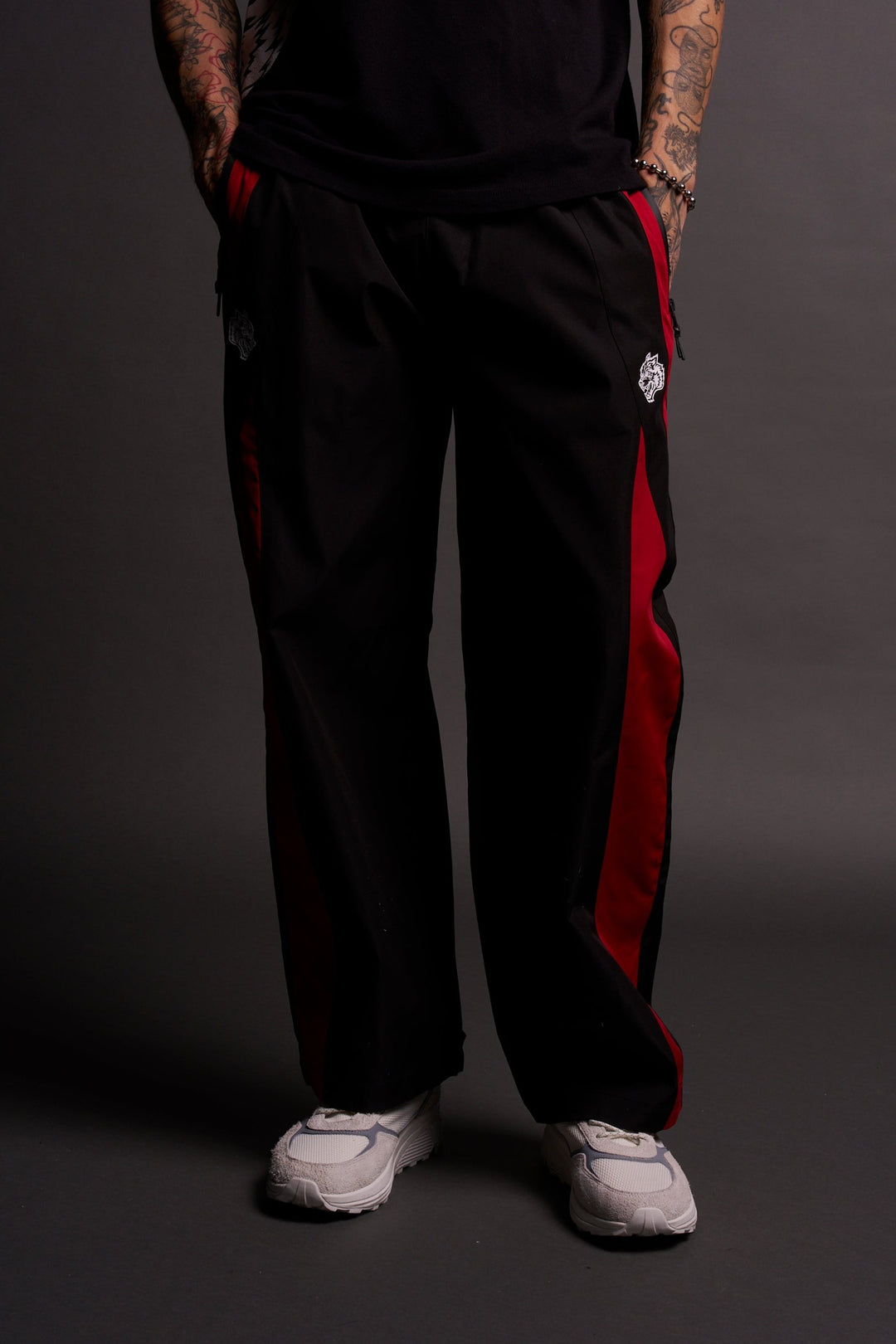 Dual Wolf Chopper Brolic Unisex Track Pants in Black/Red