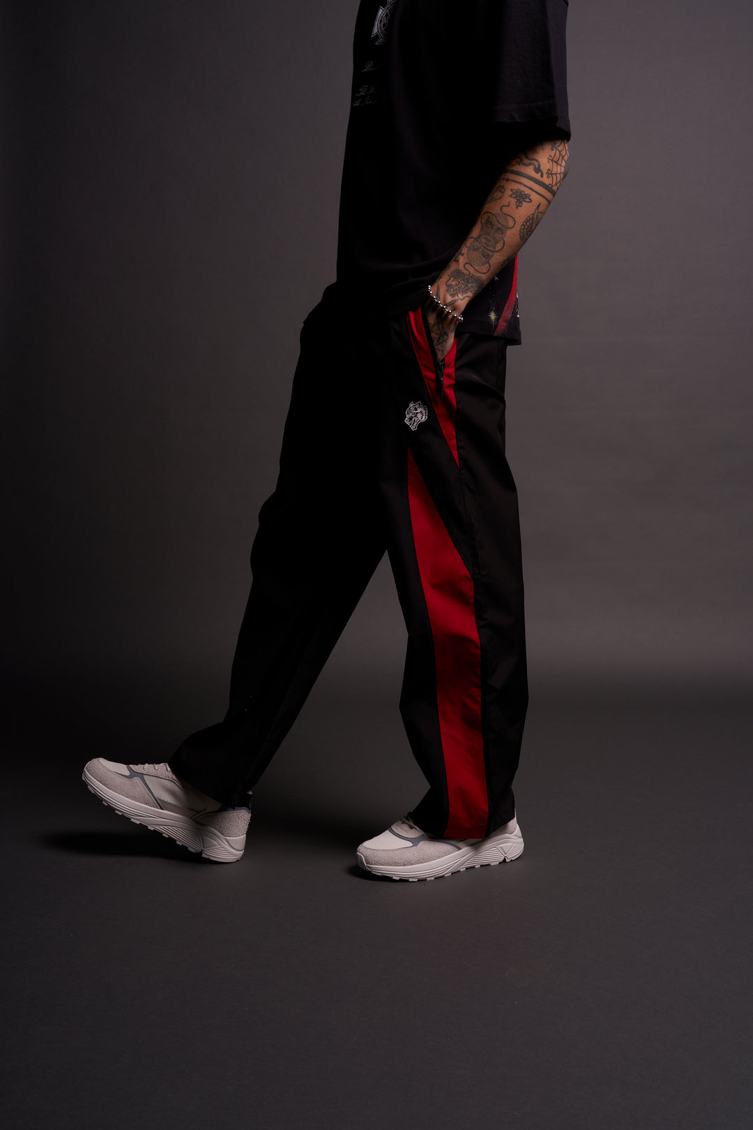 Dual Wolf Chopper Brolic Unisex Track Pants in Black/Red