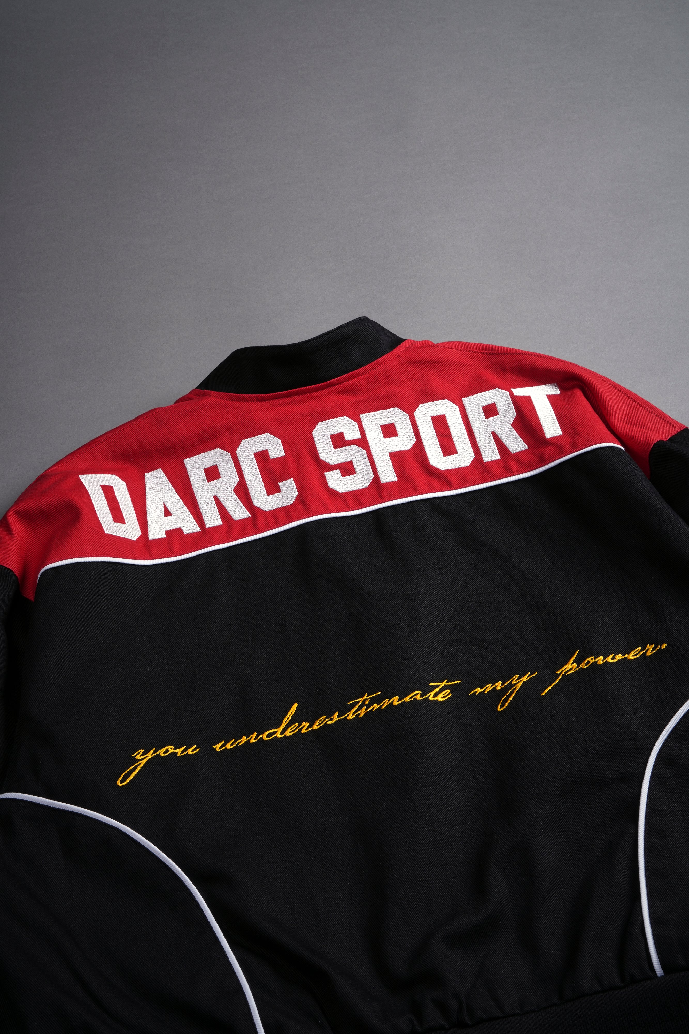 You Underestimate My Power Grit Road Racing Jacket in Black/Red