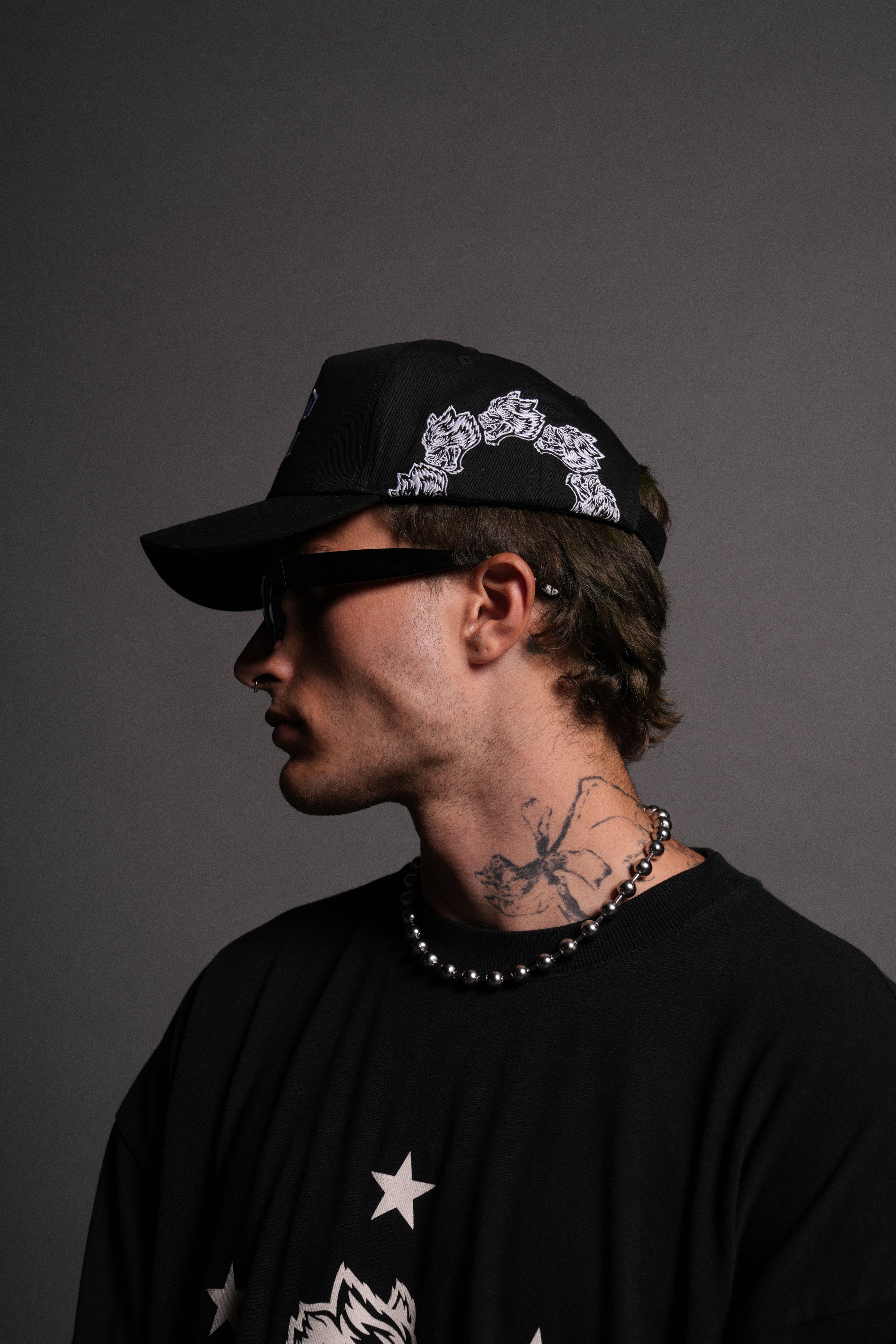 Surrounded by Wolves 5 Panel Hat in Black