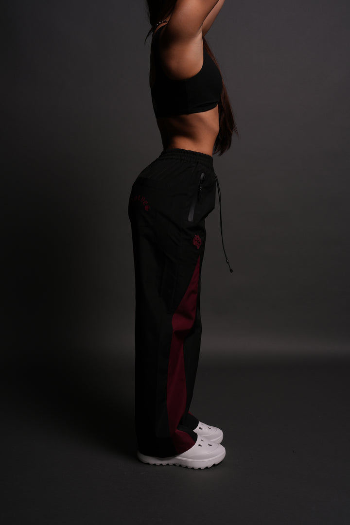 Dual Wolf Chopper She Brolic Track Pants in Black/Oxblood