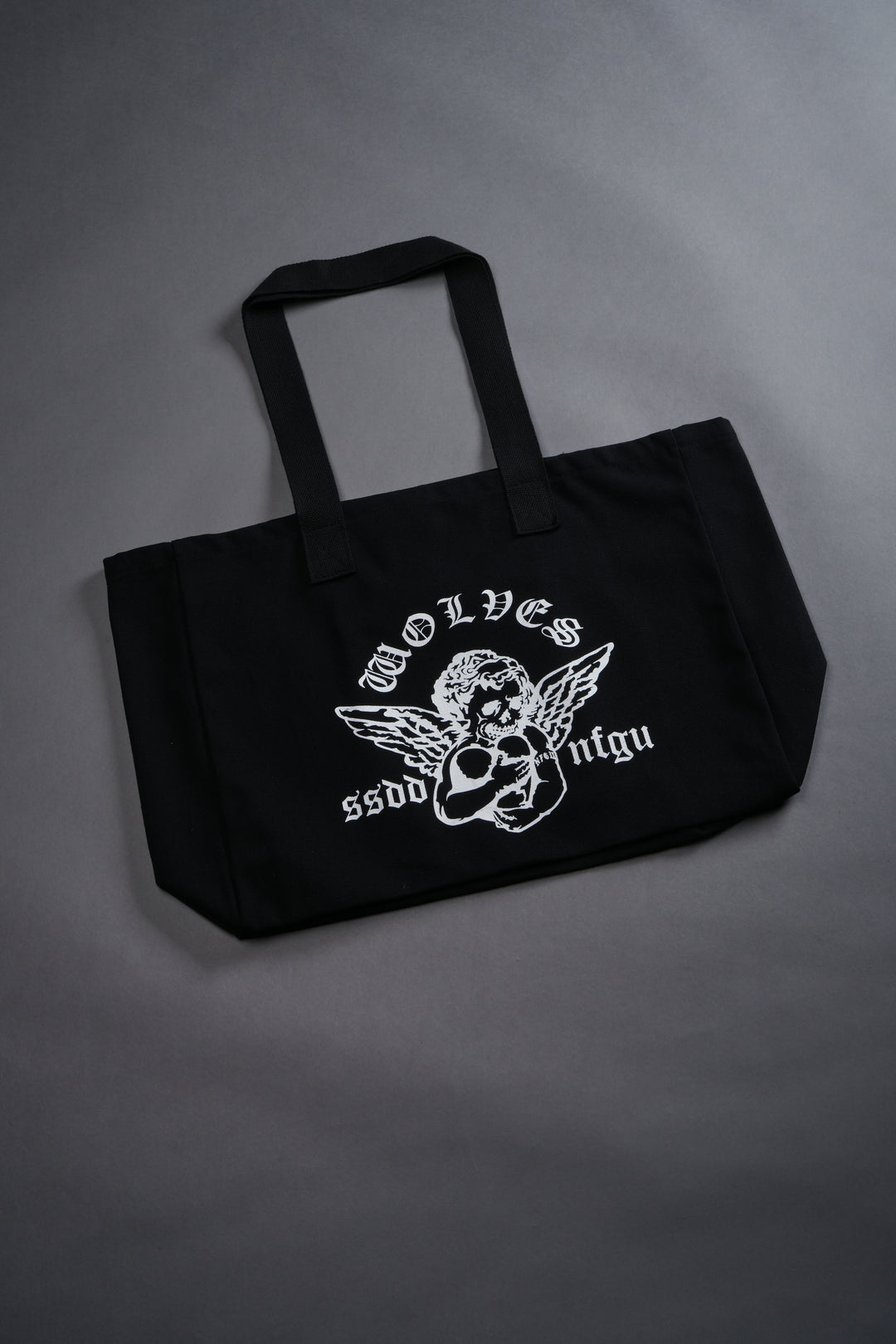 Shielded Heart Canvas Tote Bag in Black