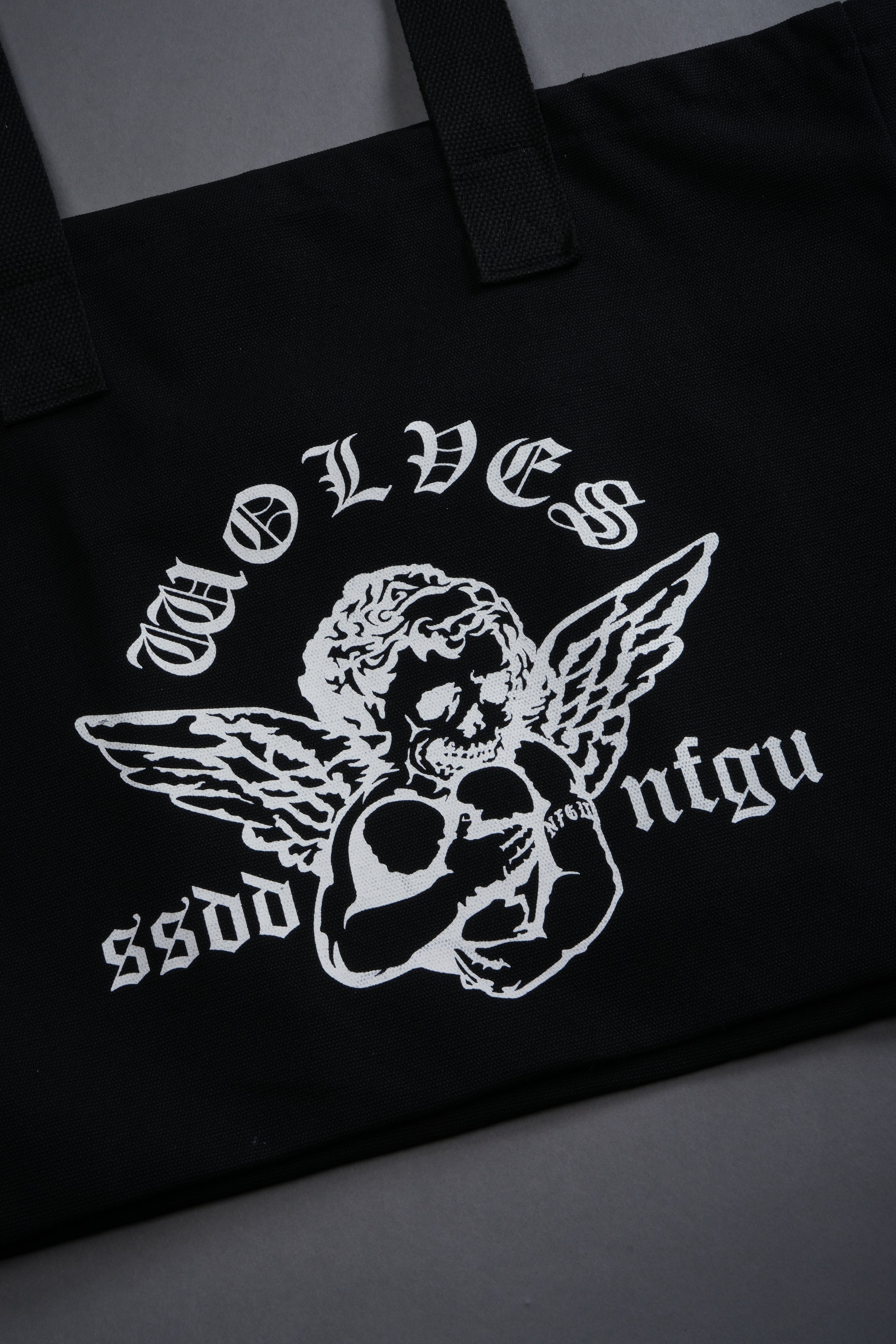 Shielded Heart Canvas Tote Bag in Black