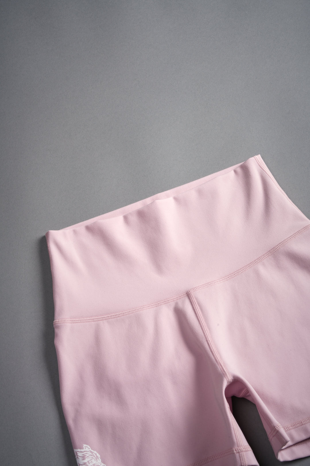 Dual Wolf Pump Energy Shorts in Pink Dust