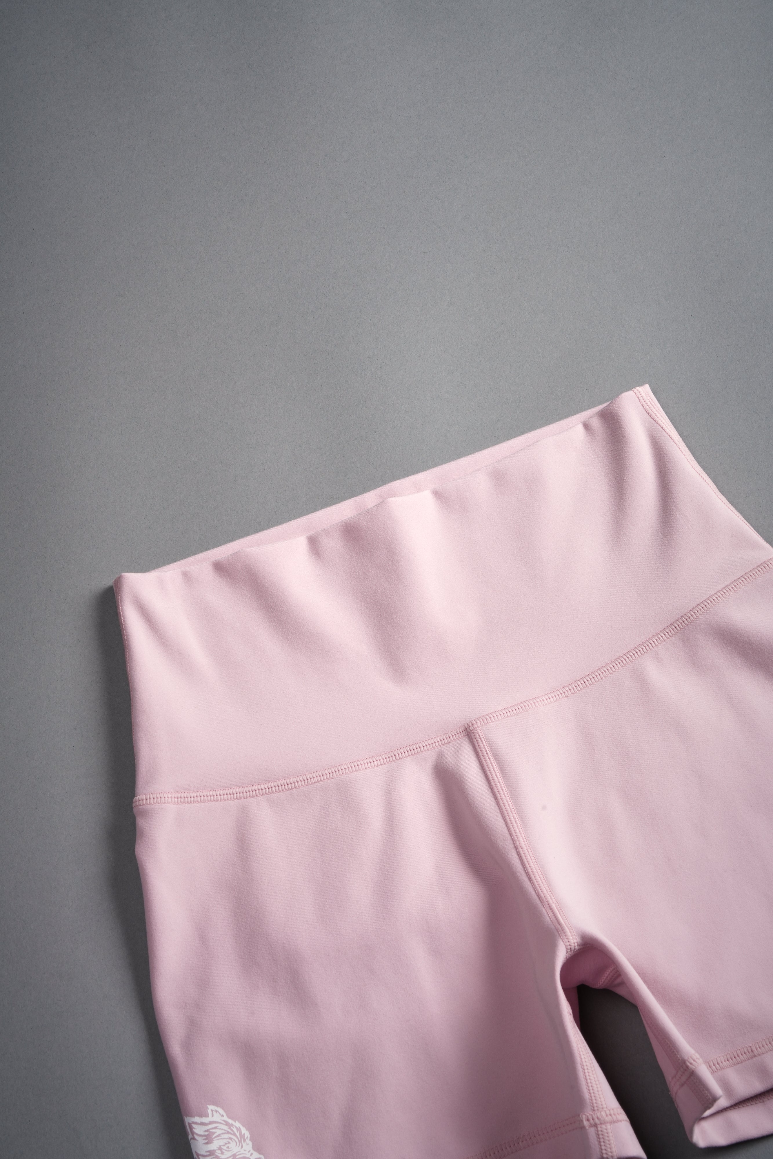 Dual Wolf Pump Energy Shorts in Pink Dust