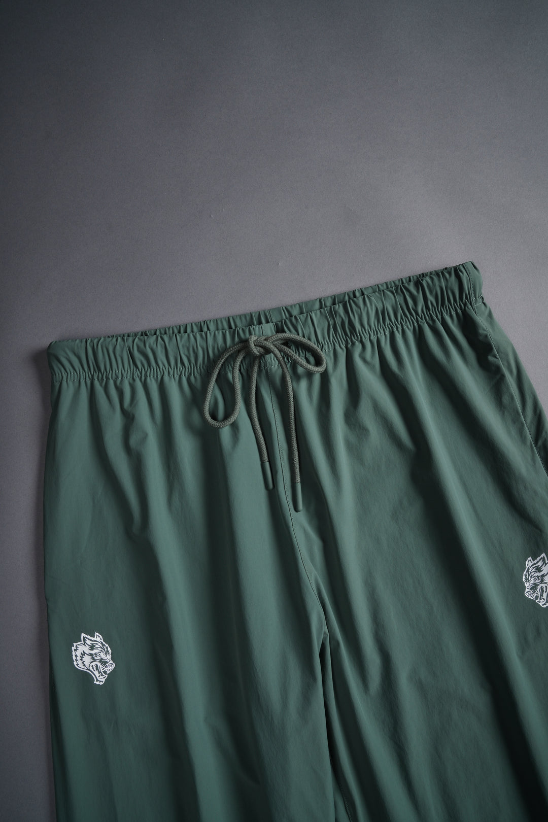 Dual Wolf Head Hybrid Nylon Track Pants in Hunter Green