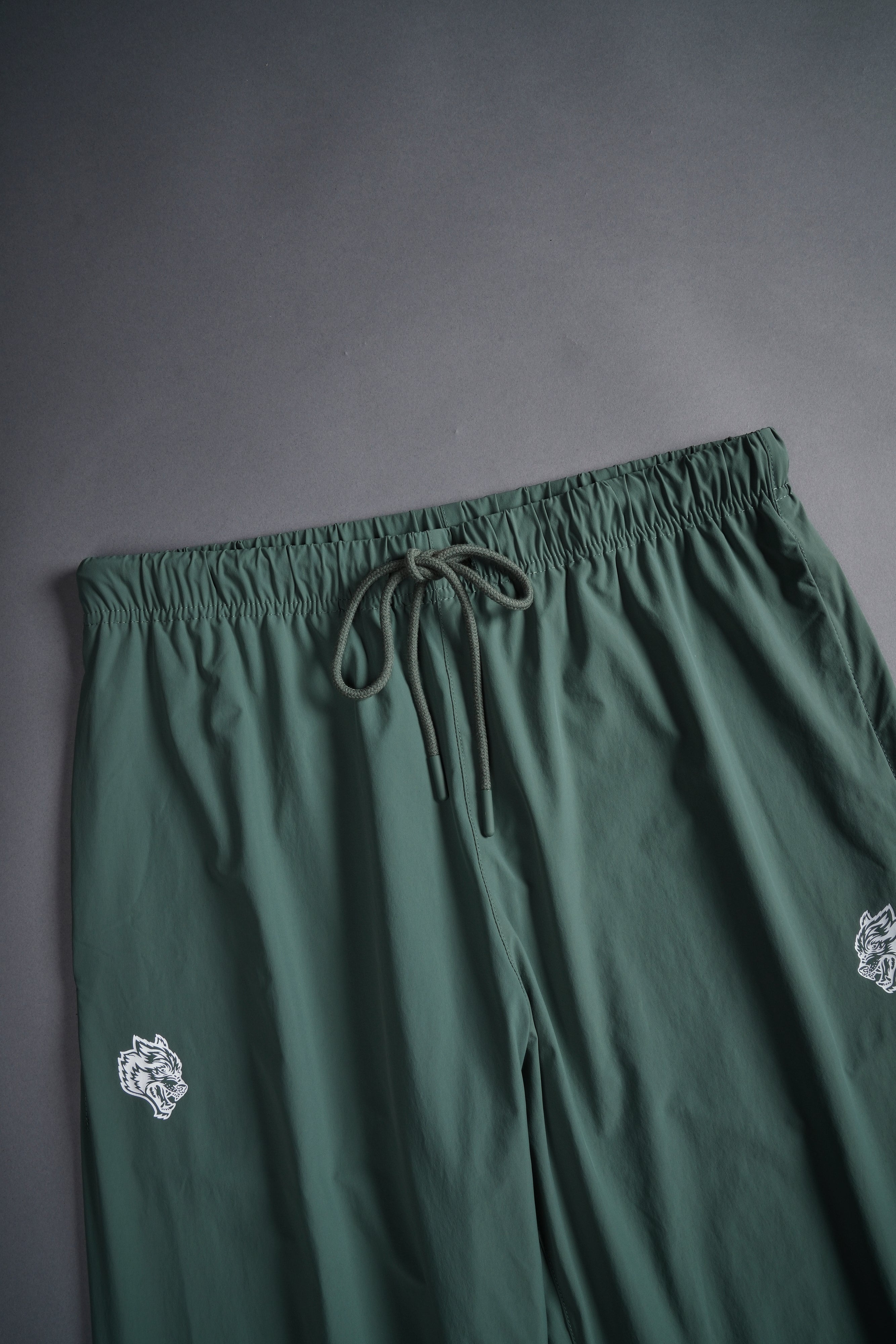Dual Wolf Head Hybrid Nylon Track Pants in Hunter Green