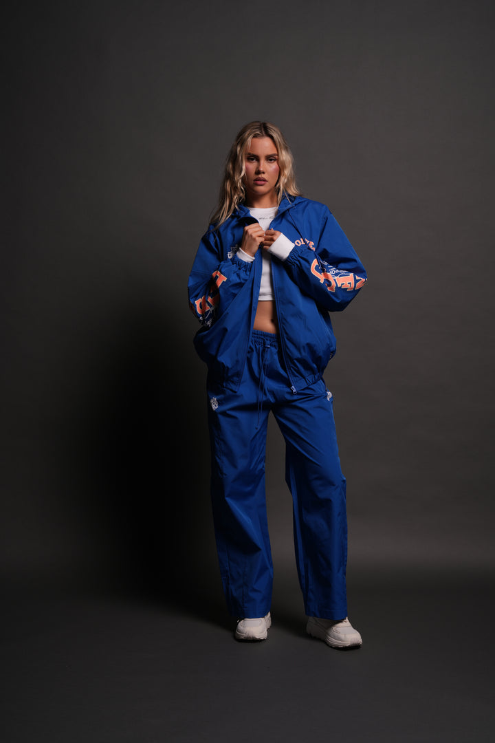 Dual Wolf Chopper Brolic Unisex Track Pants in Cobalt Blue