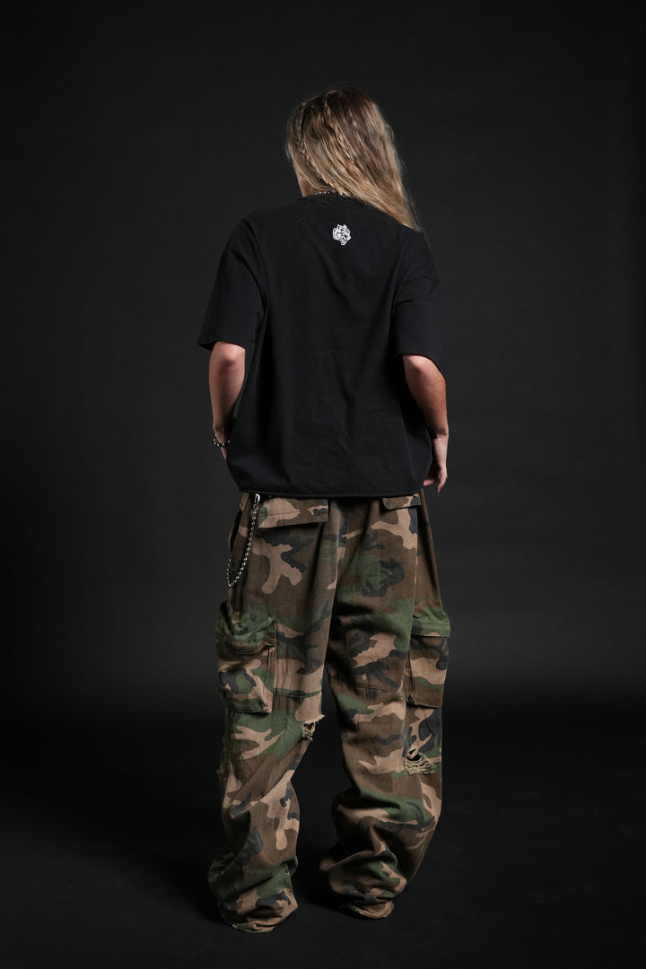 Awakened Power Grunge Mid Length Raw Hem Tee in Black