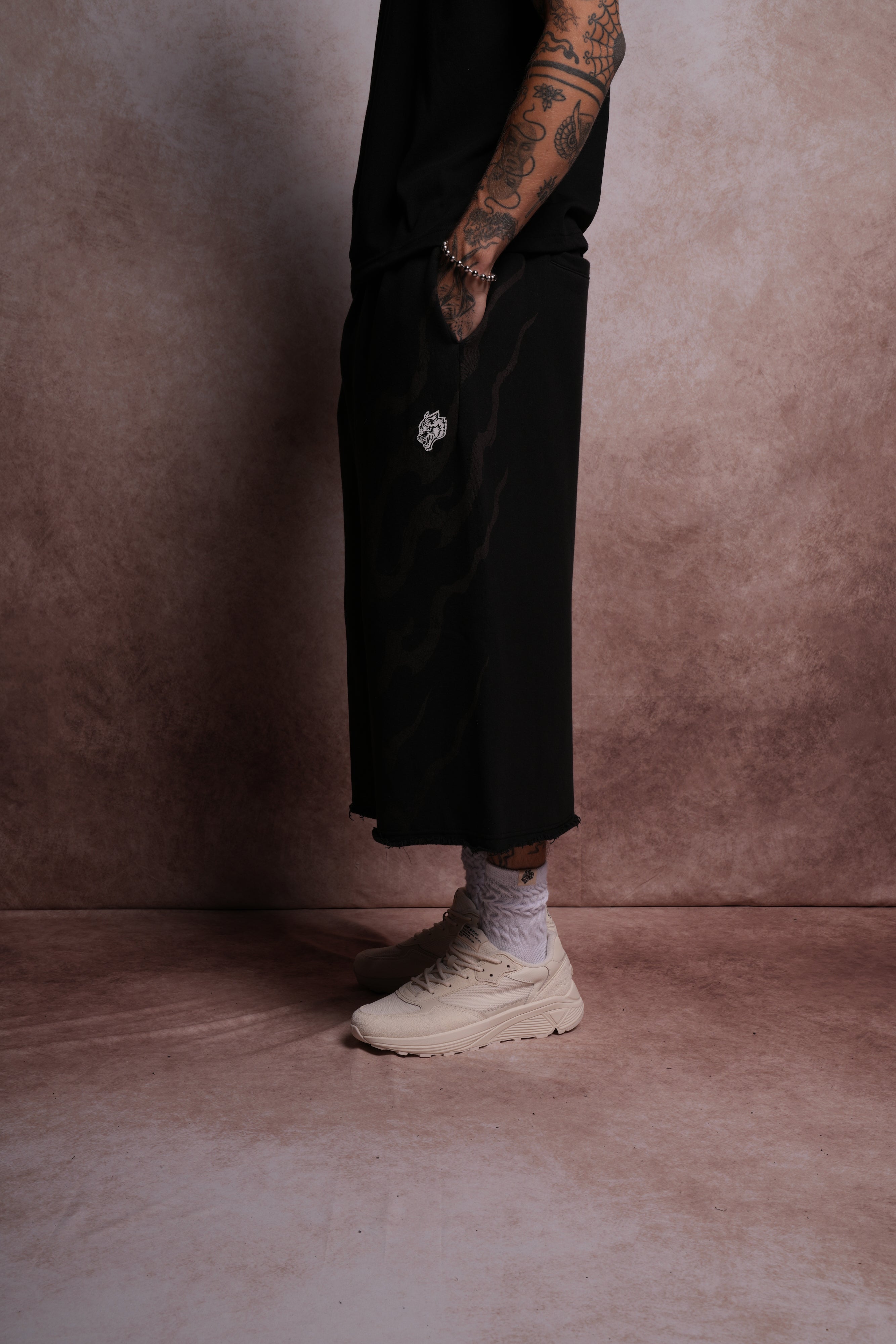 Darc Infernal Oversized Omen Cropped Sweat Pants in Black