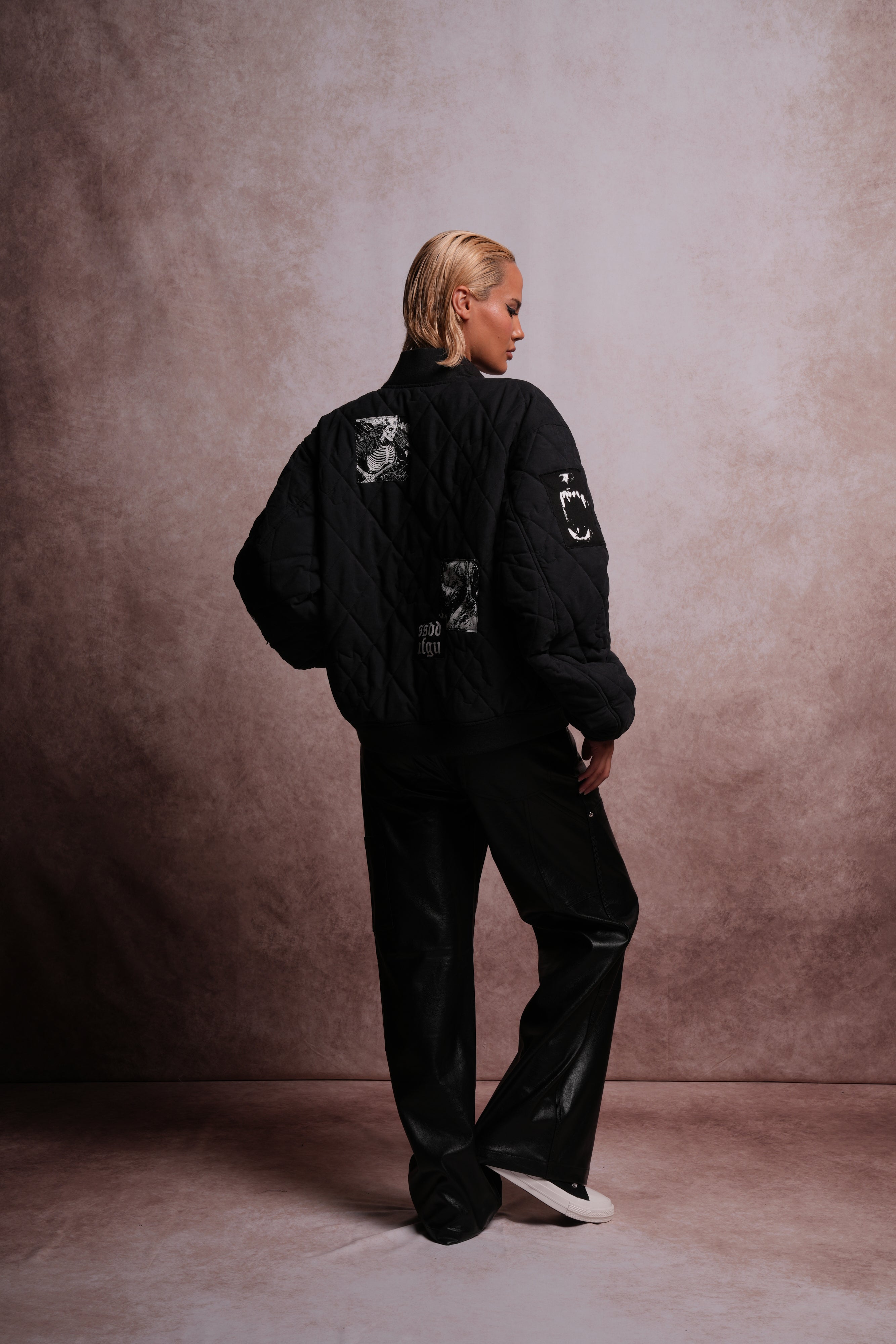 Patched Wolf Hesh Cloud Quilted Reversible Bomber Jacket in Black