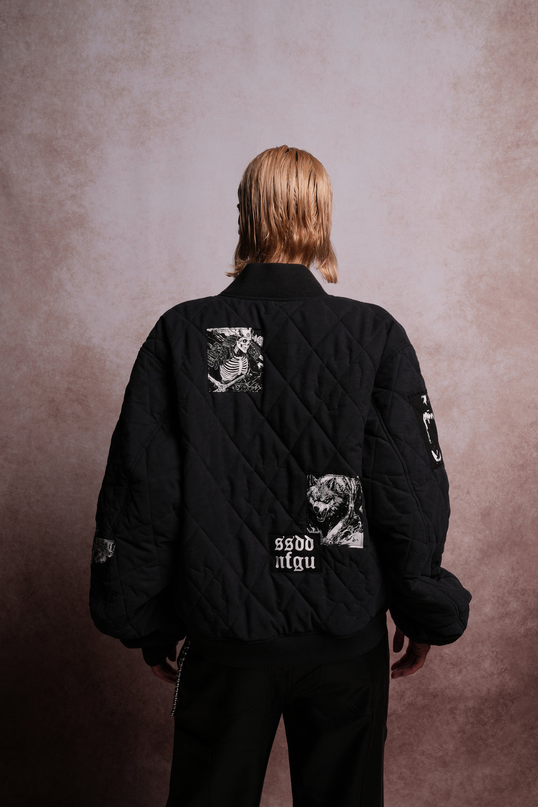 Patched Wolf Hesh Cloud Quilted Reversible Bomber Jacket in Black
