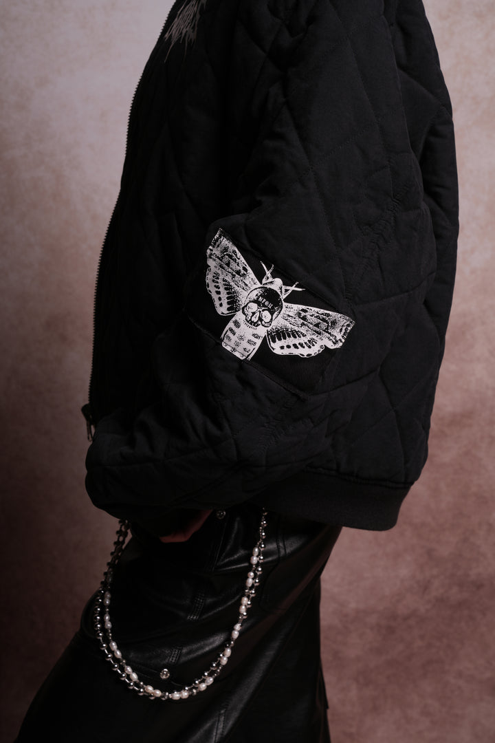 Patched Wolf Hesh Cloud Quilted Reversible Bomber Jacket in Black