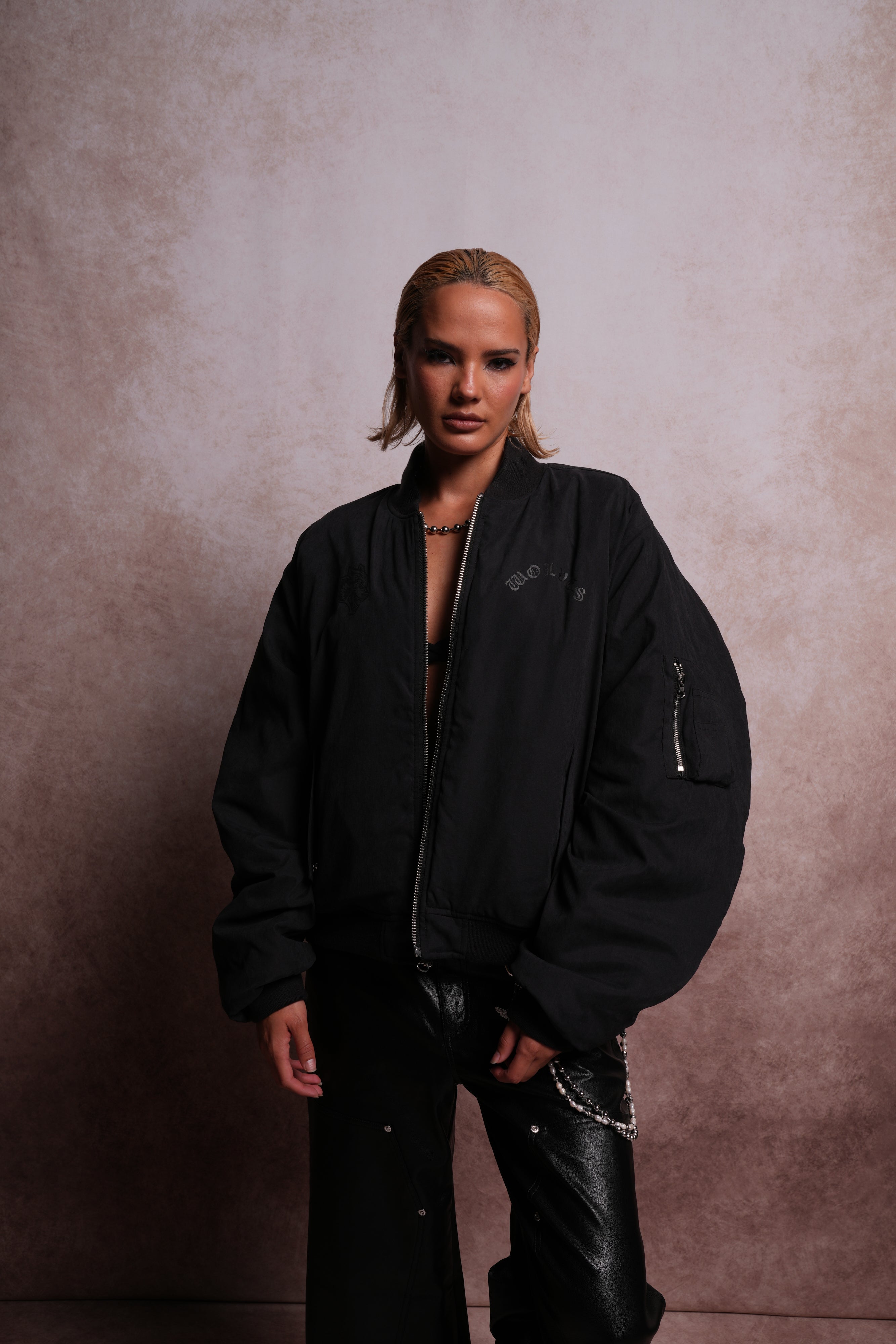 Patched Wolf Hesh Cloud Quilted Reversible Bomber Jacket in Black
