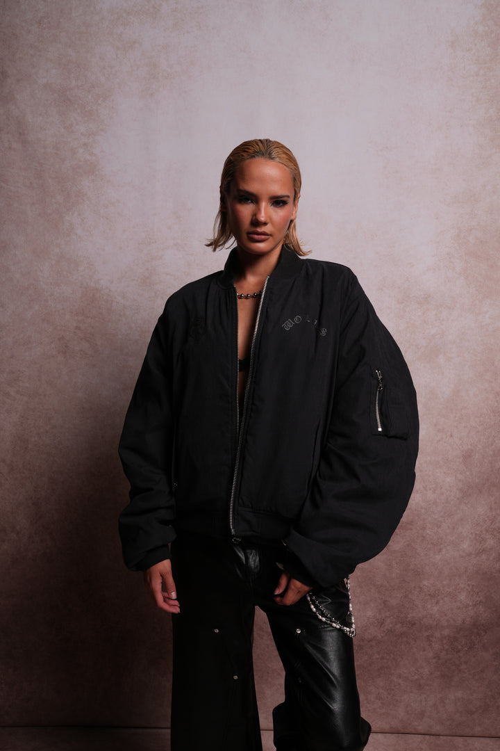 Patched Wolf Hesh Cloud Quilted Reversible Bomber Jacket in Black