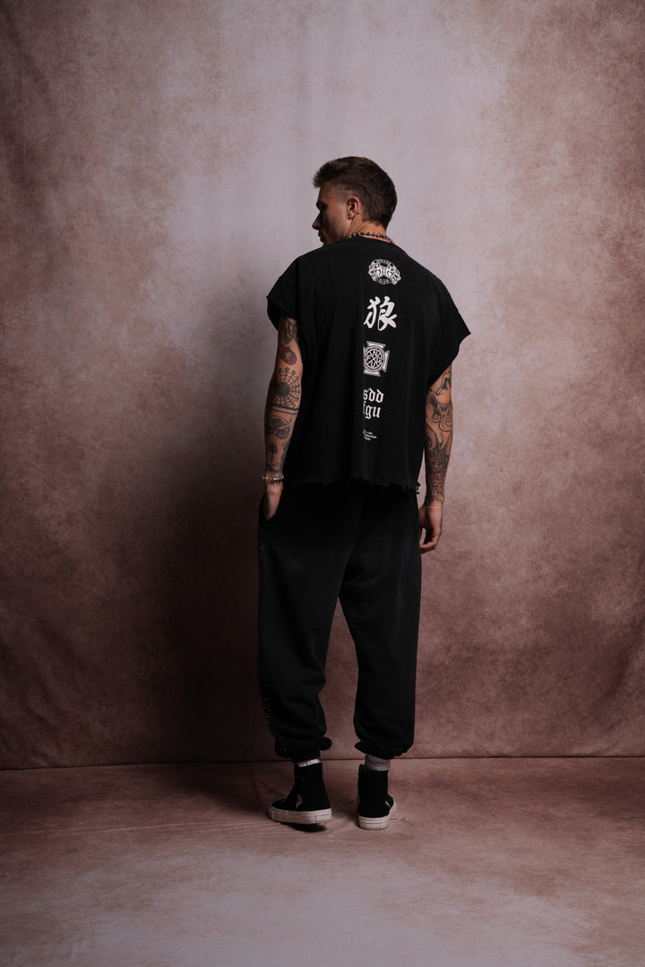 Wolves Flame Destroyed Grunge Cut-Off Tee in Black Spine Sun Fade