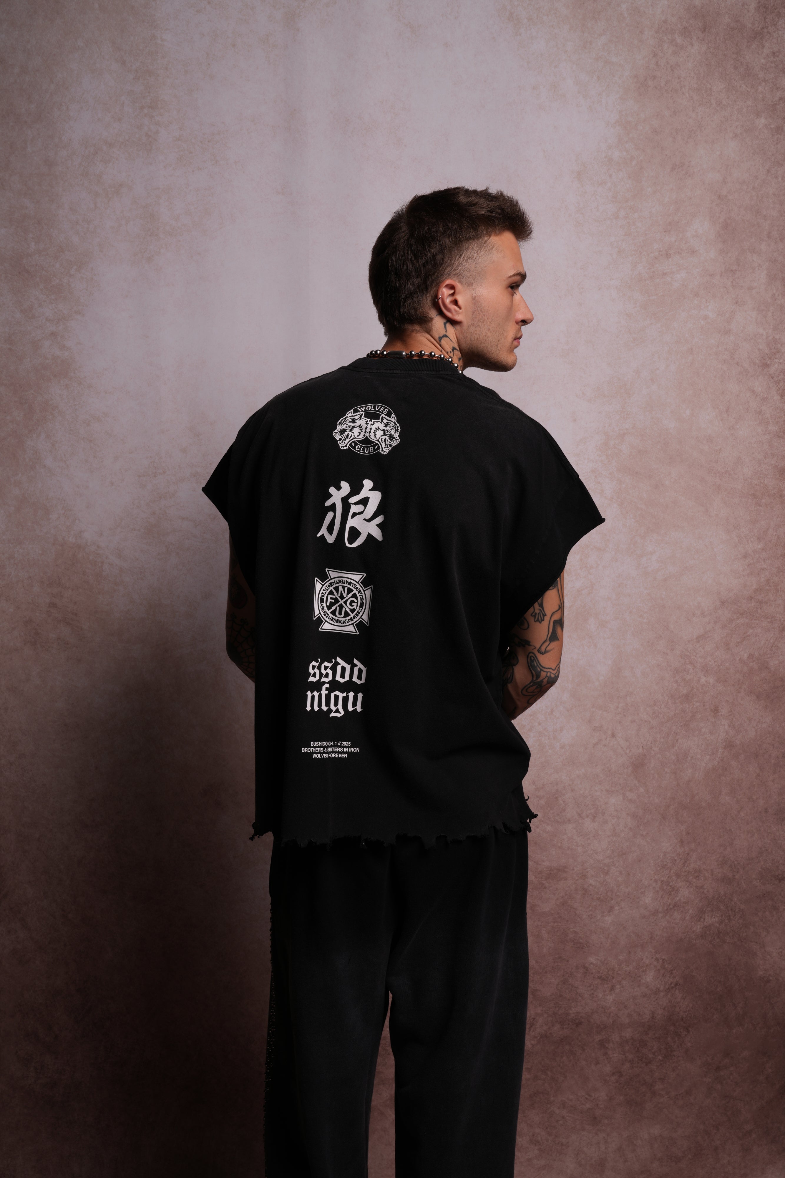 Wolves Flame Destroyed Grunge Cut-Off Tee in Black Spine Sun Fade