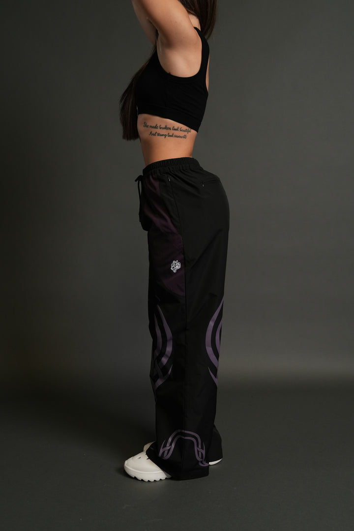Dual Finite Code She Nadia Track Pants in Black/Phantom Purple