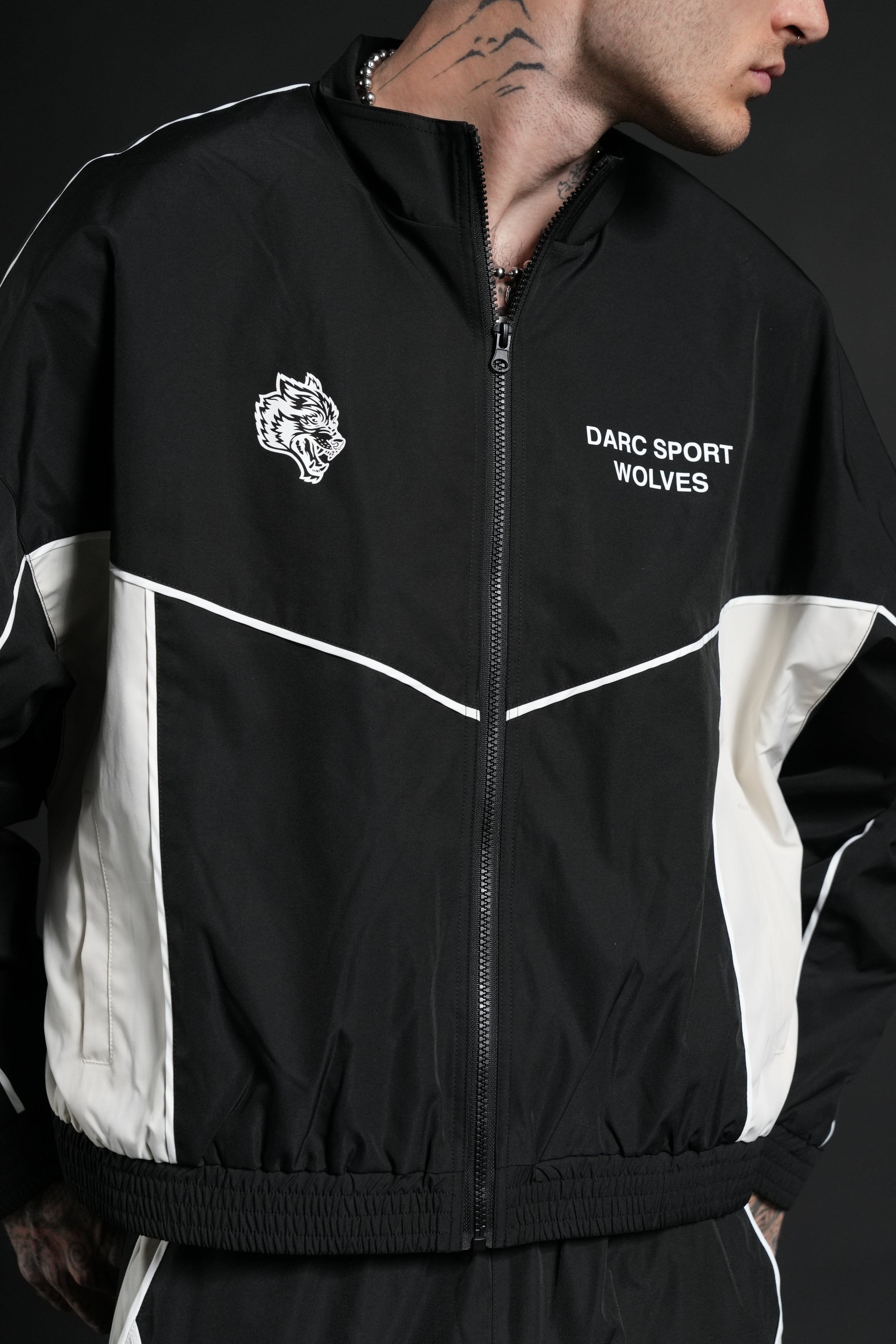Darc Sport Wolves Unisex Pyramid Quinn Track Jacket in Black/Sand