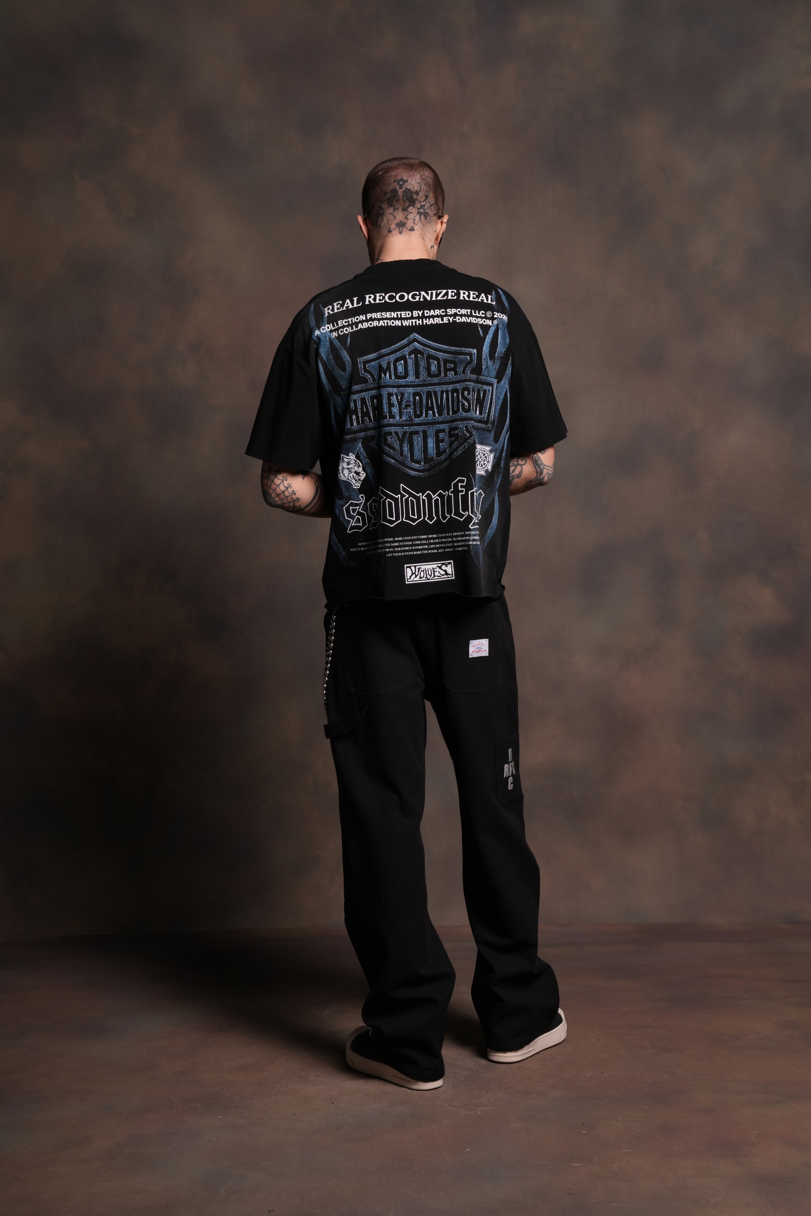 Ride Forever Distressed Grunge Mid-Length Raw Hem Tee in Black Sun Fade