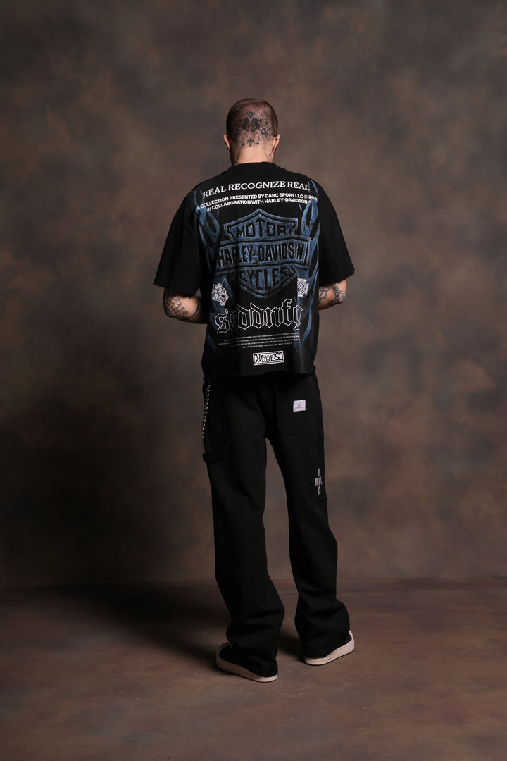 Ride Forever Distressed Grunge Mid-Length Raw Hem Tee in Black Sun Fade