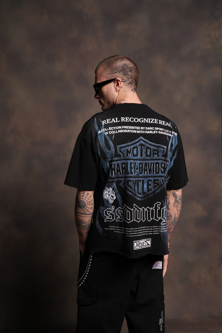 Ride Forever Distressed Grunge Mid-Length Raw Hem Tee in Black Sun Fade