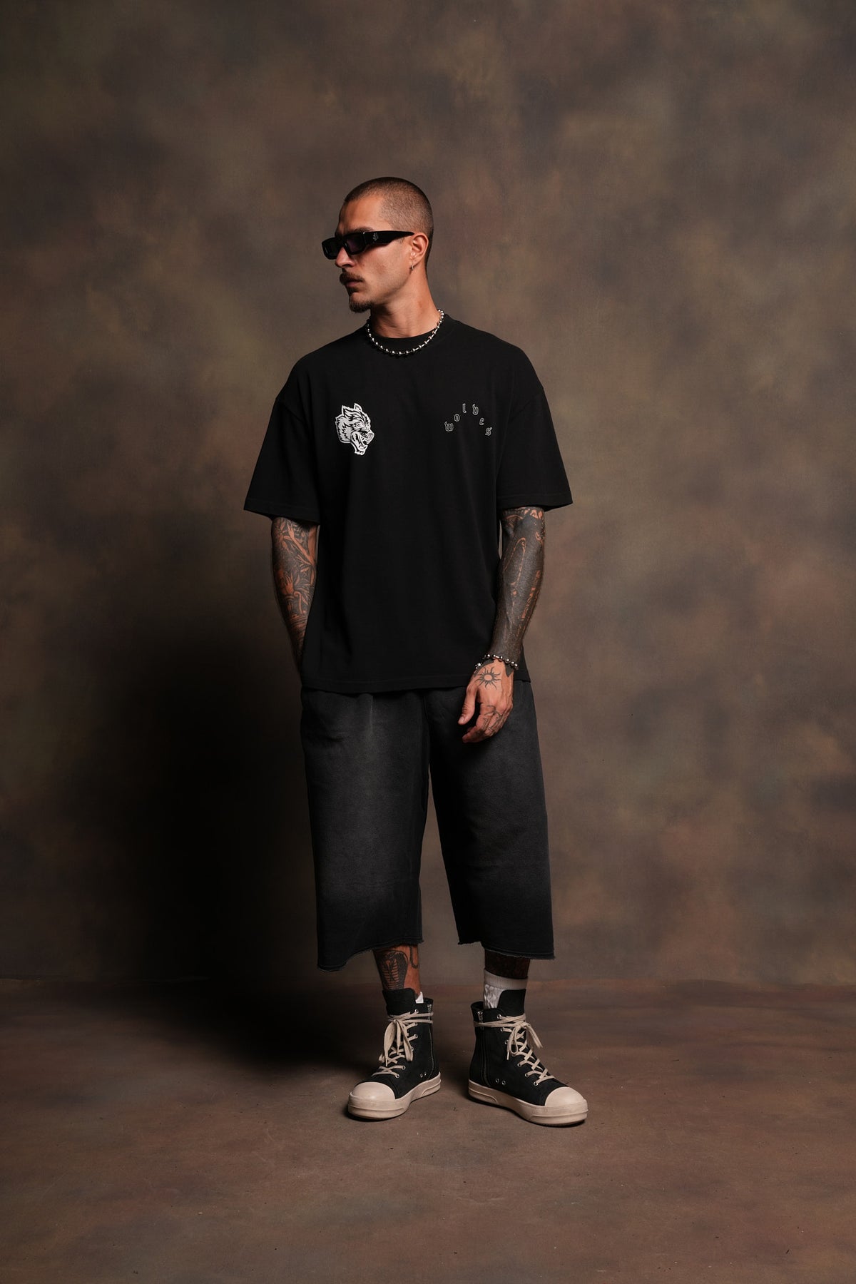 Hand That Holds Premium Oversized Tee In Black